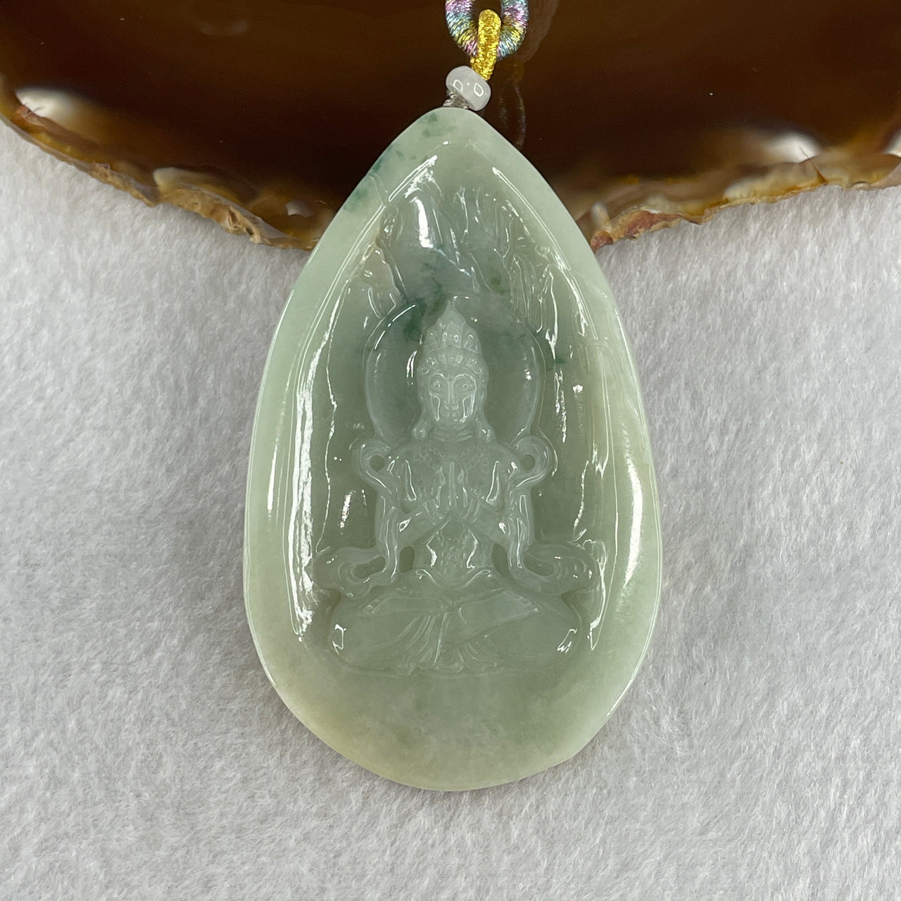 Natural Type A Light Green with Yellow Skin and Blueish Green Piao Hua Jadeite Guan Yin Pendant 77.96g 73.4 by 45.2 by 12.9mm