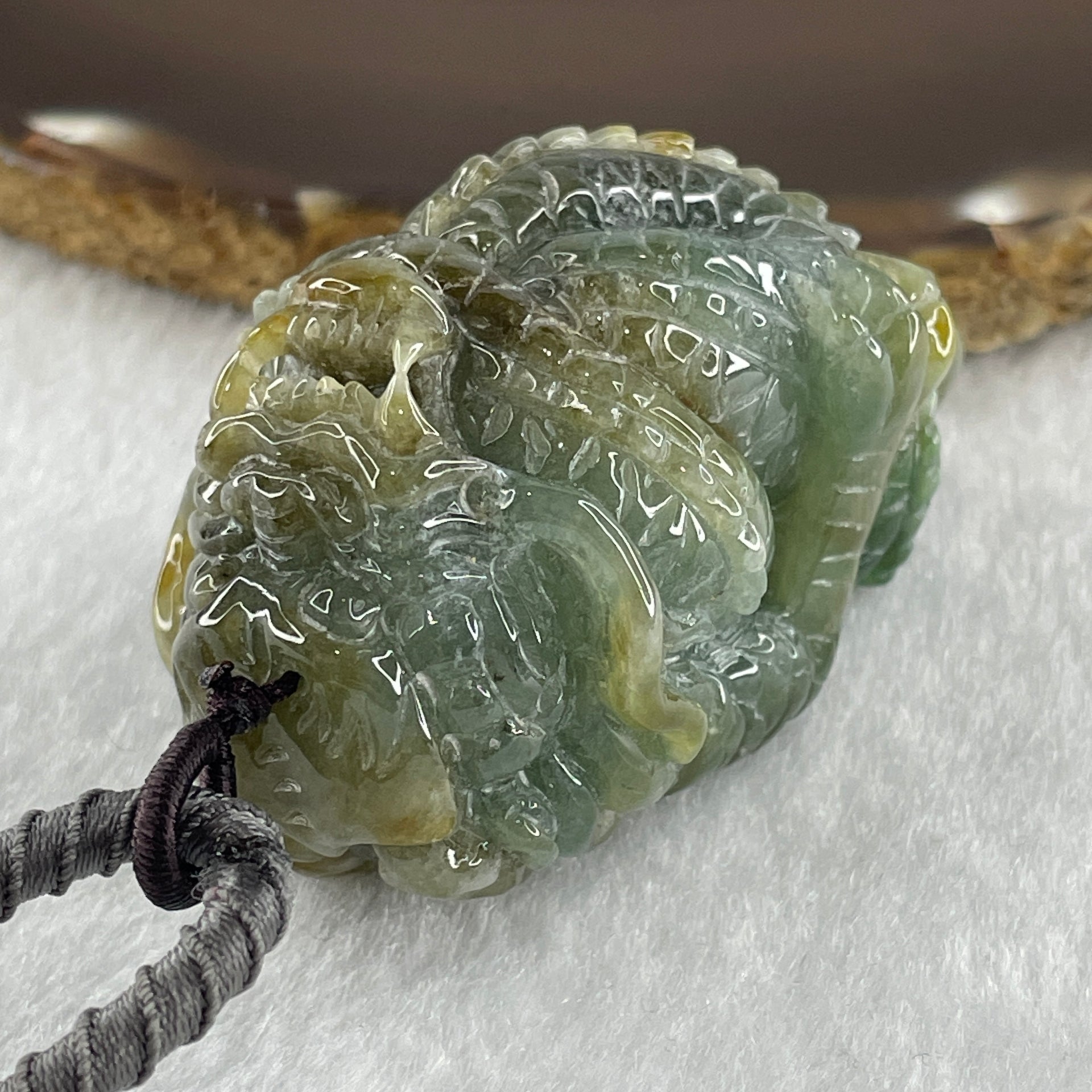 Type A Green with Yellow Patches Jadeite Dragon Pendant 97.19g 57.7 by 34.2 by 34.4mm - Huangs Jadeite and Jewelry Pte Ltd