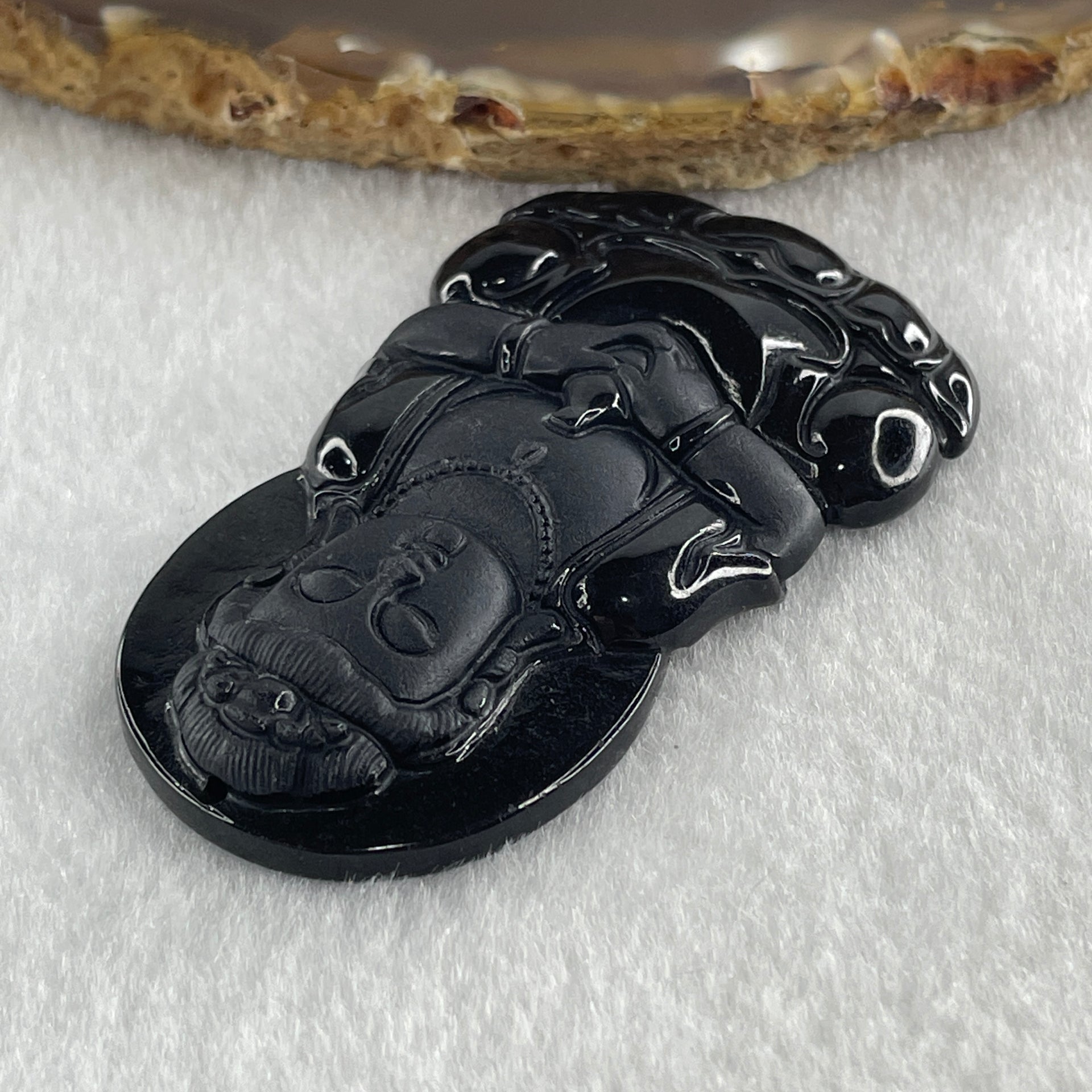 Type A Opaque to Partial Translucent Black Omphacite Jadeite Guan Yin on Dragon Pendant 36.54g 66.7 by 43.5 by 8.0mm - Huangs Jadeite and Jewelry Pte Ltd