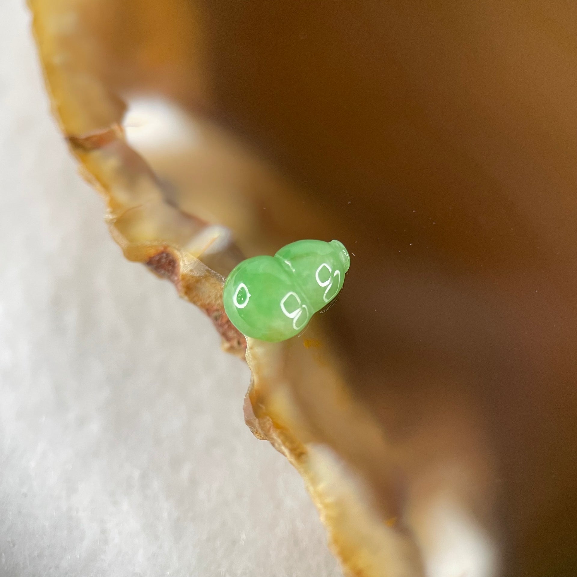 Type A Old Mine Spicy Green Jadeite Hulu Charm Stone For Setting 0.23g 8.0 by 5.5 by 2.8mm - Huangs Jadeite and Jewelry Pte Ltd