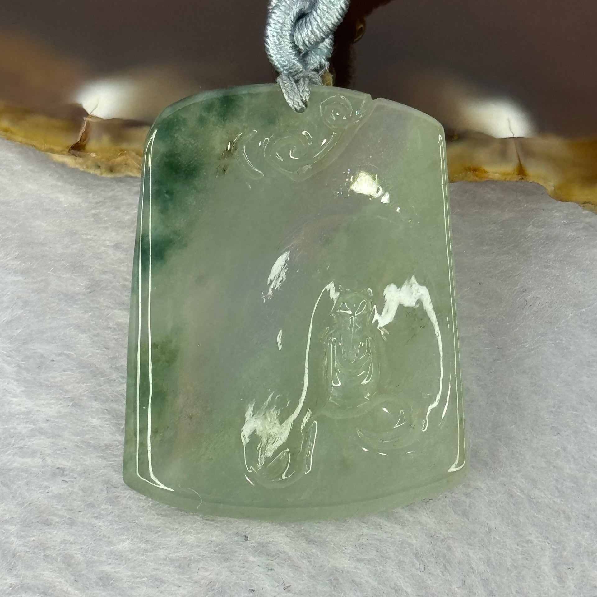 Type A Semi Icy Green Piao Hua Jadeite Shan Shui with Benefactor Gui Ren Pendent 13.79g 34.8 by 27.7 by 4.9mm - Huangs Jadeite and Jewelry Pte Ltd