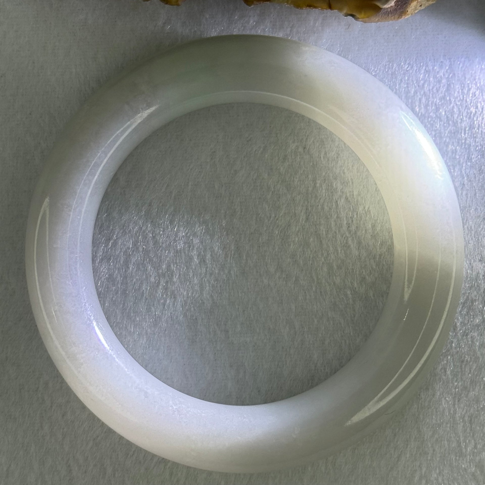 Type A Translucent Faint Blueish Green with Faint Lavender Jadeite Bangle Internal Diameter 56.79mm 437.29cts 87.85g 12.0 by 13.0mm With NGI Cert 32886087 (Close to Perfect) - Huangs Jadeite and Jewelry Pte Ltd