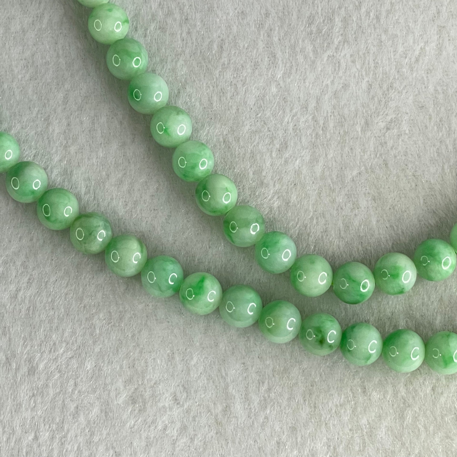 Good Grade Type A Apple Green with Emerald Green Piao Hua Jadeite Beads Necklace 50.33g 54cm 6.9 to 7.8mm 74 Beads - Huangs Jadeite and Jewelry Pte Ltd