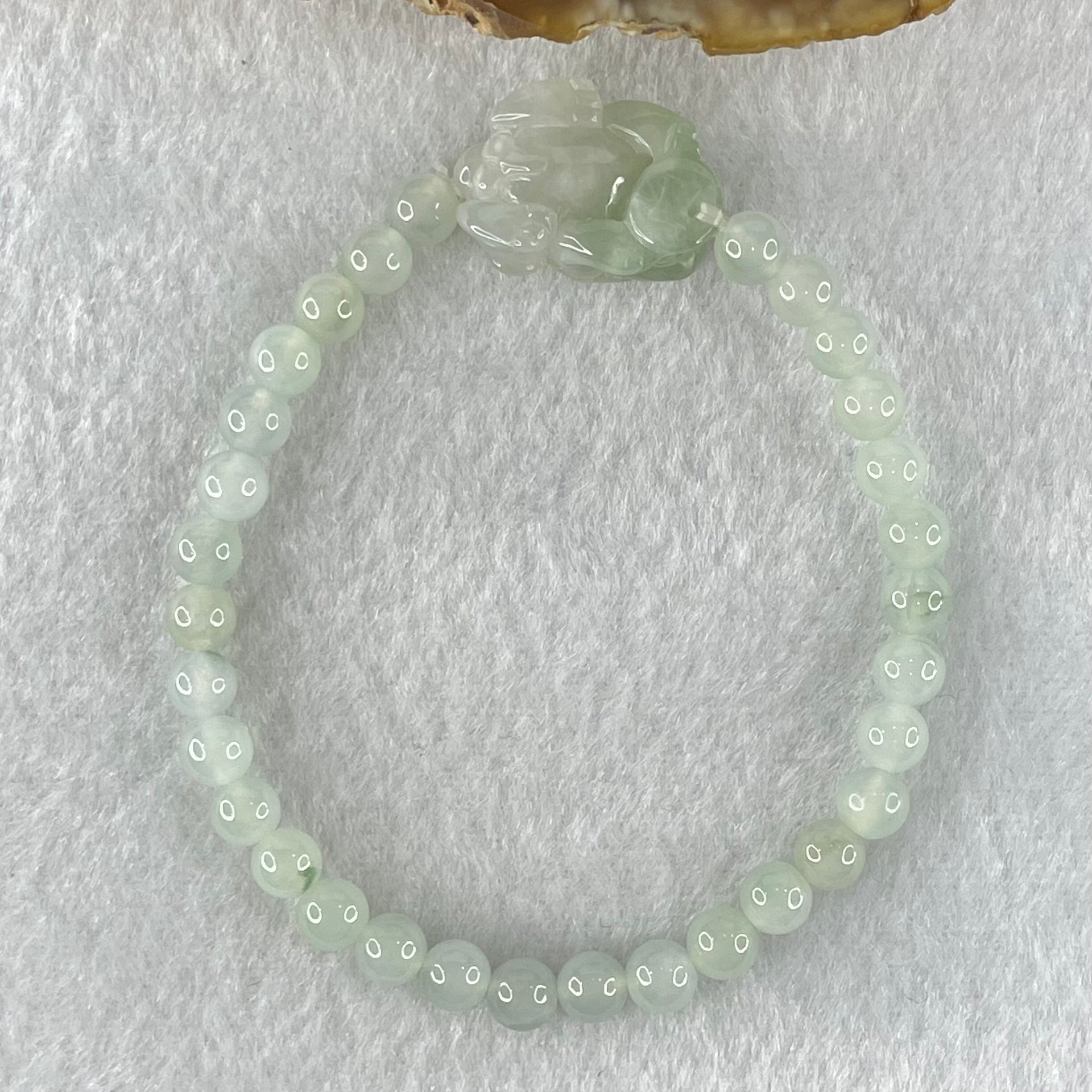 Type A Faint Blueish Green Jadeite Beads with Light Blueish Green Male Pixiu Charm Bracelet 12.93g 15.5cm 5.5cm 31 Beads 21.6 by 14.1 by 10.7mm - Huangs Jadeite and Jewelry Pte Ltd