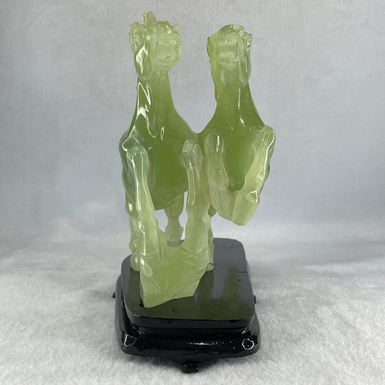 Natural Semi Icy Green Serpentine Double Horse with Wooden Stand Display 1119.9g 190.0 by 166.0 by 96.0mm - Huangs Jadeite and Jewelry Pte Ltd