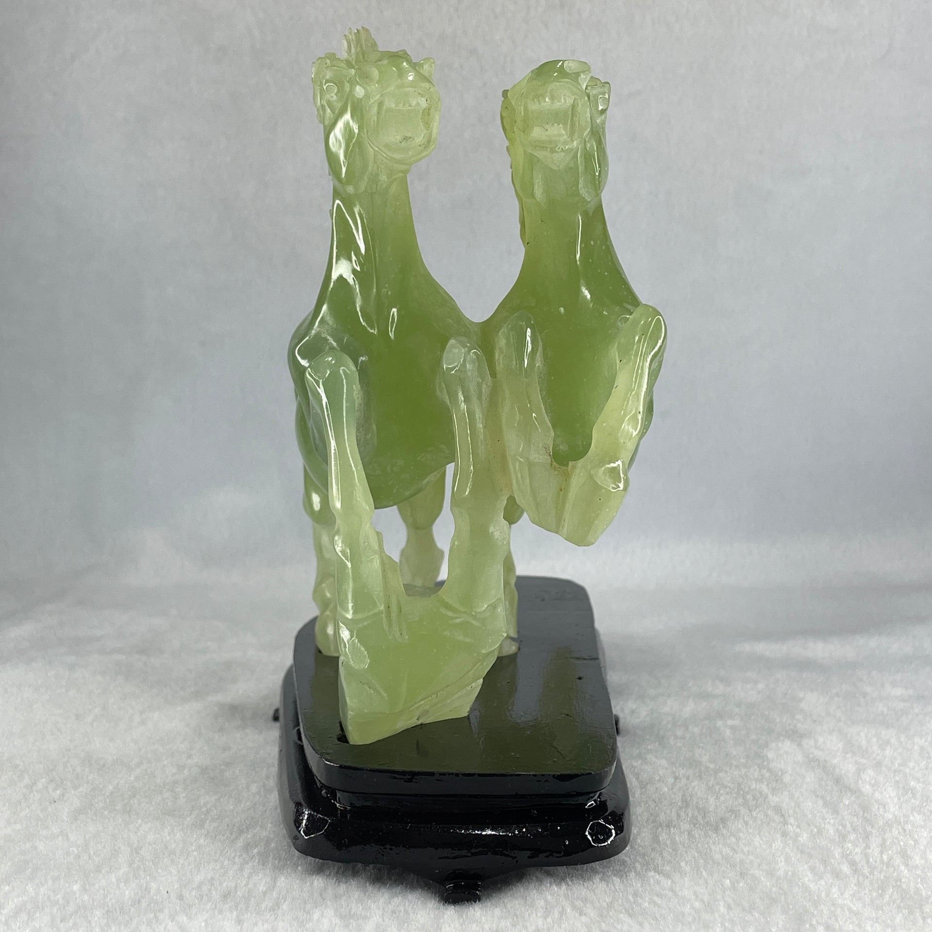 Natural Semi Icy Green Serpentine Double Horse with Wooden Stand Display 1119.9g 190.0 by 166.0 by 96.0mm - Huangs Jadeite and Jewelry Pte Ltd