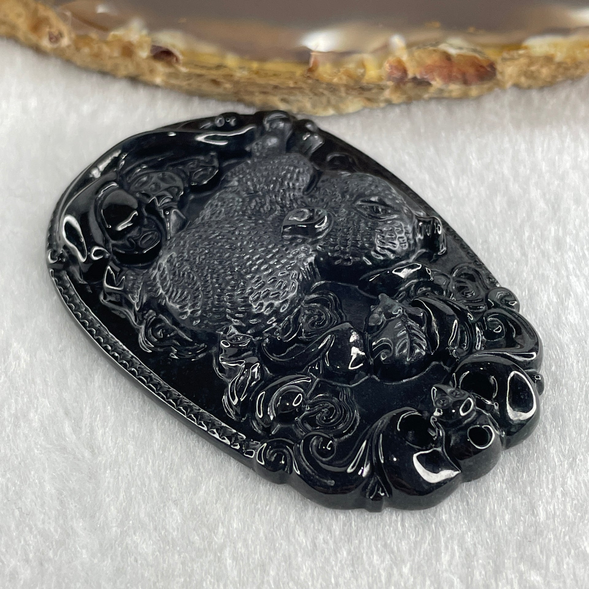 Type A Opaque to Partial Translucent Black Omphacite Jadeite Pig Pendant 26.30g 59.7 by 40.1 by 8.5mm - Huangs Jadeite and Jewelry Pte Ltd