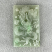 Type A Light Apple Green Jadeite Dragon Pendant 87.90g 69.4 by 44.2 by 14.2mm - Huangs Jadeite and Jewelry Pte Ltd