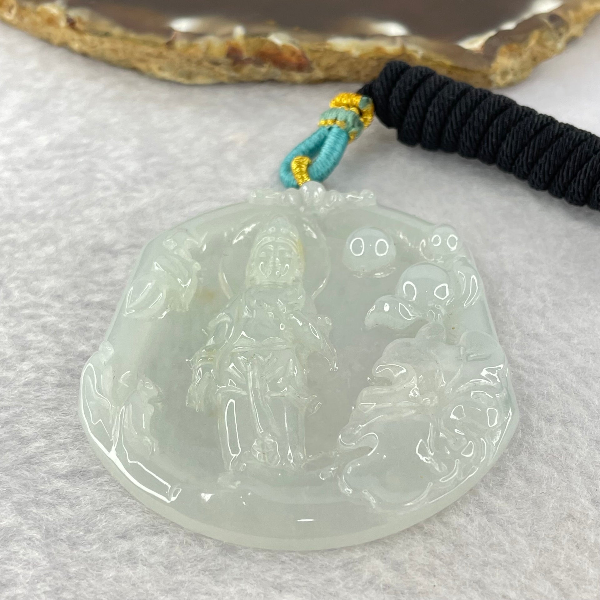 Type A Light Green to white Jadeite Guan Yin Pendent 32.29g 57.8 by 52.6 by 6.6mm - Huangs Jadeite and Jewelry Pte Ltd