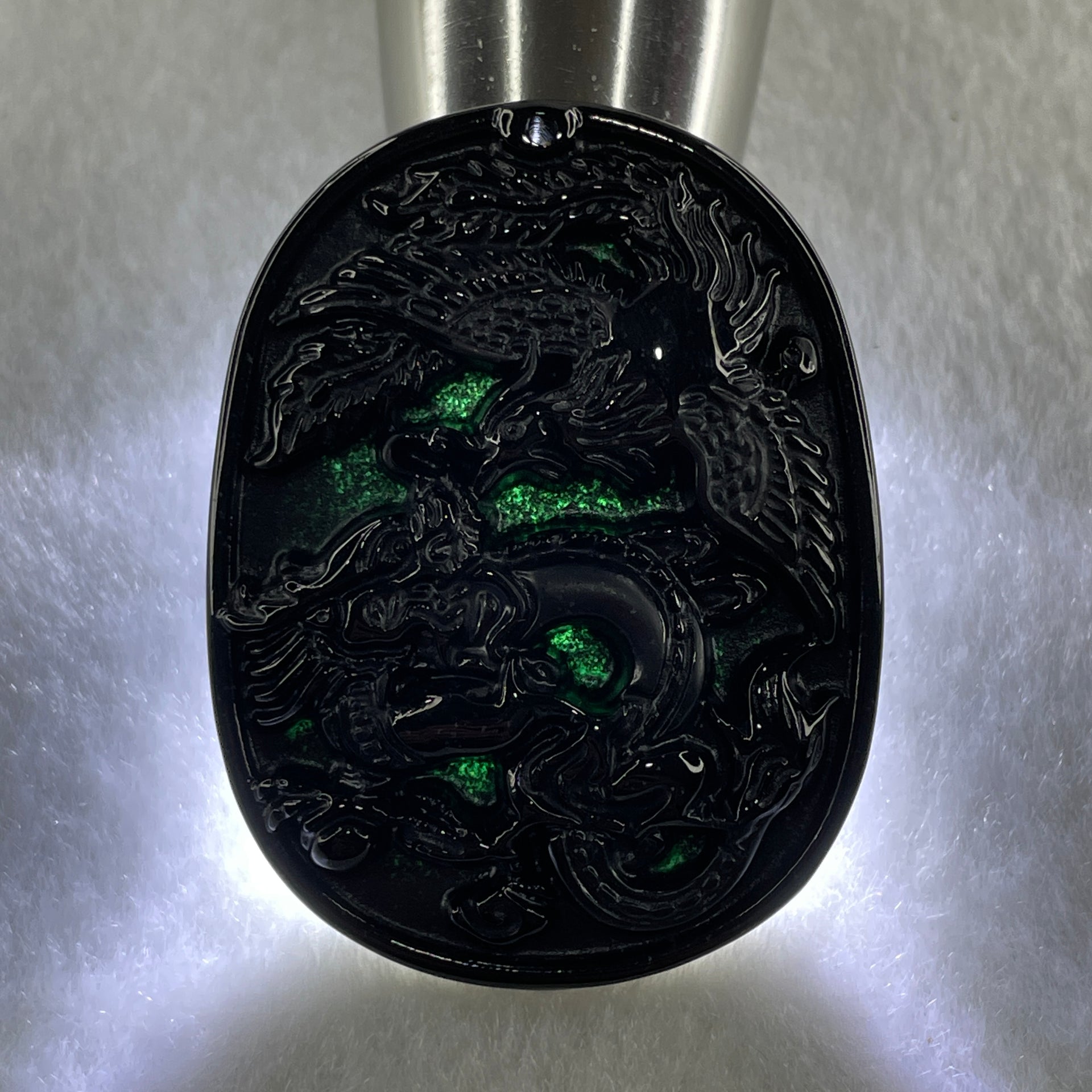 Type A Opaque to Partial Translucent Black Omphacite Jadeite Dragon and Phoenix Pendant 20.96g 50.2 by 38.3 by 8.4mm - Huangs Jadeite and Jewelry Pte Ltd