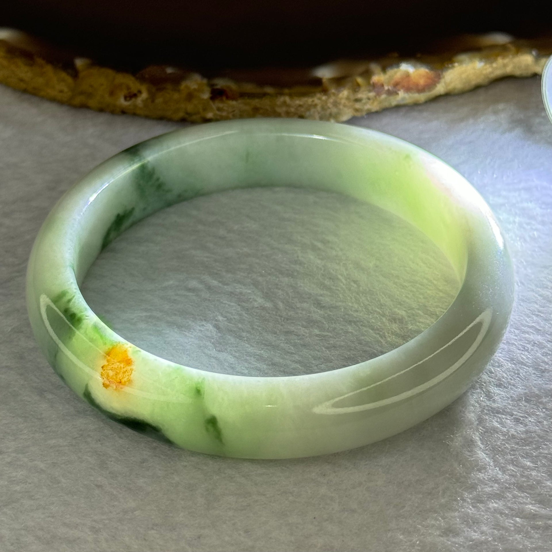 Type A Light Green with Green Piao Hua and Brown Spot Jadeite Bangle Internal Diameter 58.7mm 55.08g 12.4 by 8.5mm (Close to Perfect) - Huangs Jadeite and Jewelry Pte Ltd