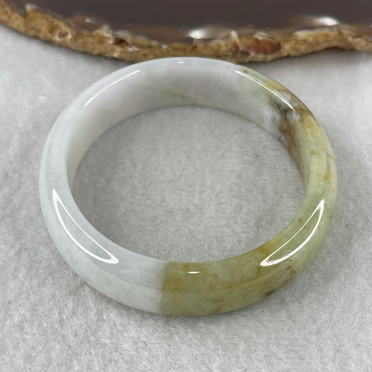 Natural Type Light Lavender with Yellowish Green Jadeite Oval Bangle 37.93g Inner Diameter 55.7mm 12.8 by 6.0mm (Slight External Rough) - Huangs Jadeite and Jewelry Pte Ltd