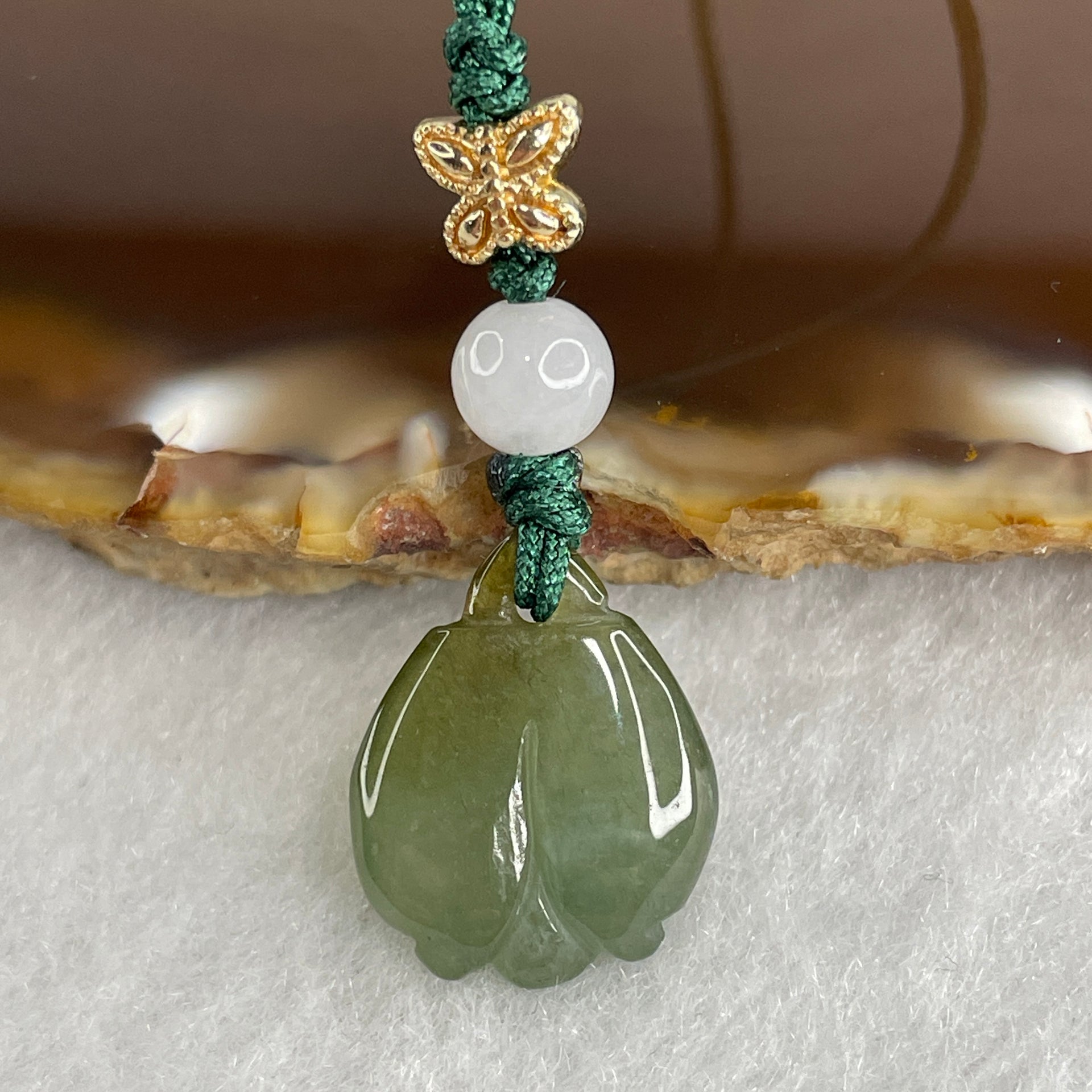Natural Type A Semi Icy Green Jadeite Flower Charm 2.31g 16.8 by 13.3 by 4.3mm - Huangs Jadeite and Jewelry Pte Ltd
