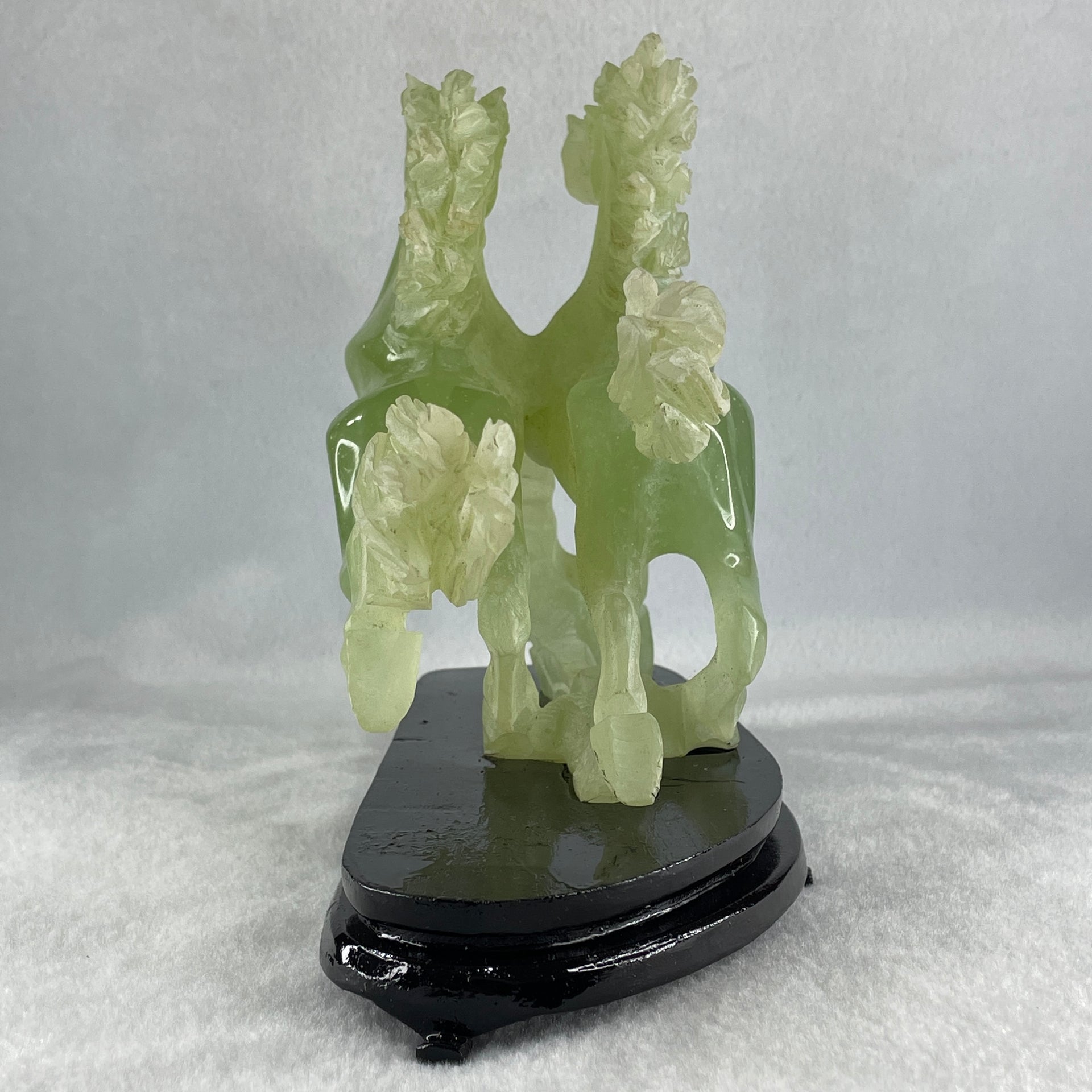 Natural Semi Icy Green Serpentine Double Horse with Wooden Stand Display 1119.9g 190.0 by 166.0 by 96.0mm - Huangs Jadeite and Jewelry Pte Ltd