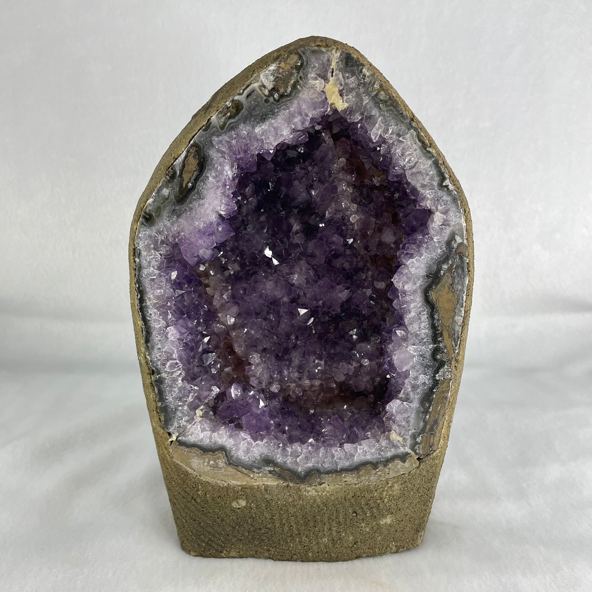 Natural Amethyst Cave with Wooden Stand 3,849.40g 145.8 by 132.6 by 160.0mm - Huangs Jadeite and Jewelry Pte Ltd