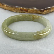 Type A Yellowish Green Lavender Jadeite Oval Bangle Internal Diameter 58.5mm 67.31g 10.7 by 8.1mm (Very Slight Fine Internal Line) - Huangs Jadeite and Jewelry Pte Ltd