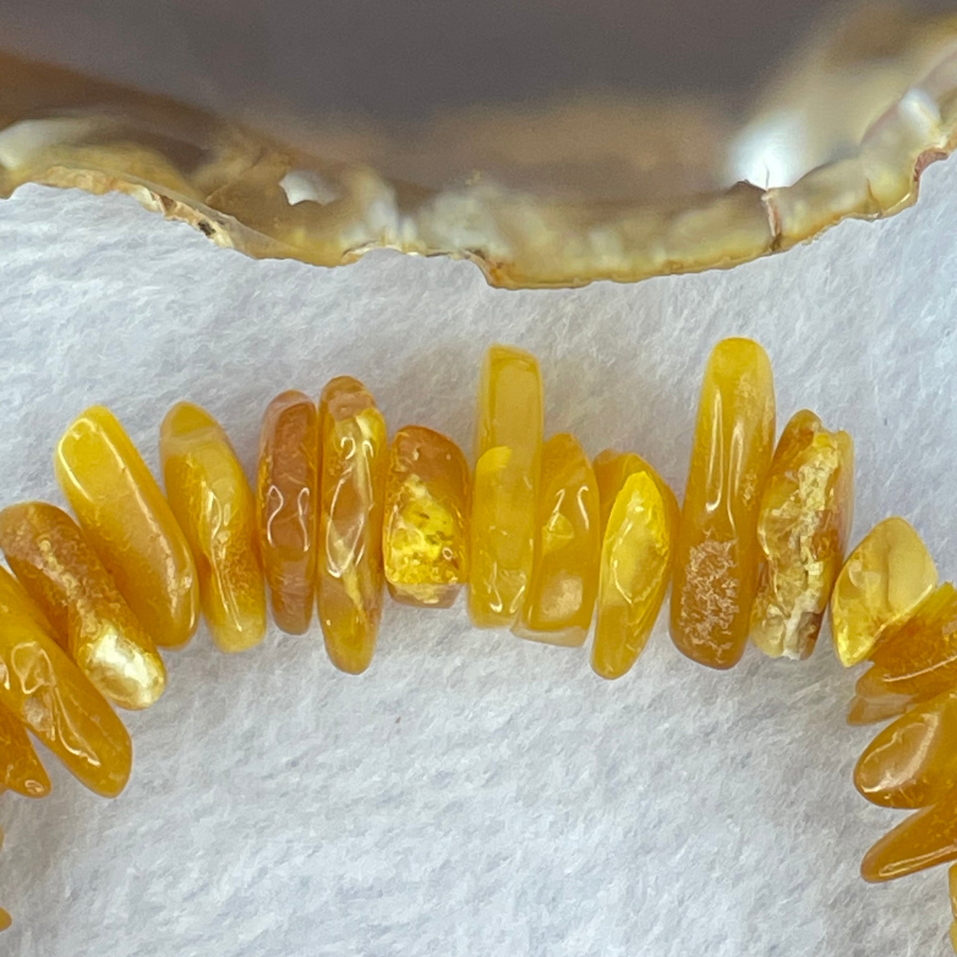 Natural Beeswax Raw Stone Irregular Beads Bracelet 天然蜜蜂蜡原石手链 22.59g 18.5cm 21.6 by 12.6 by 4.7mm, 13.1 by 11.7 by 4.8mm 54pcs - Huangs Jadeite and Jewelry Pte Ltd