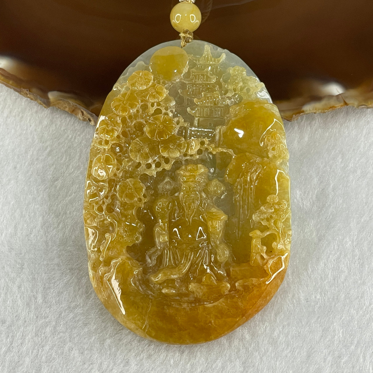 Grand Master Type A Yellowish with Light Green Patches Jadeite Cai Shen Ye God Of Fortune on Shan Shui with Gui Ren Pendant 75.70g 77.0 by 51.1 by 10.0mm