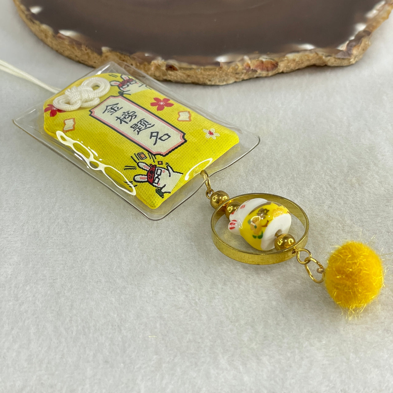 Porcelain Yellow Fortune Cat Yushou Charm 14.09g 14.8 by 17.5 by 14.4mm - Huangs Jadeite and Jewelry Pte Ltd