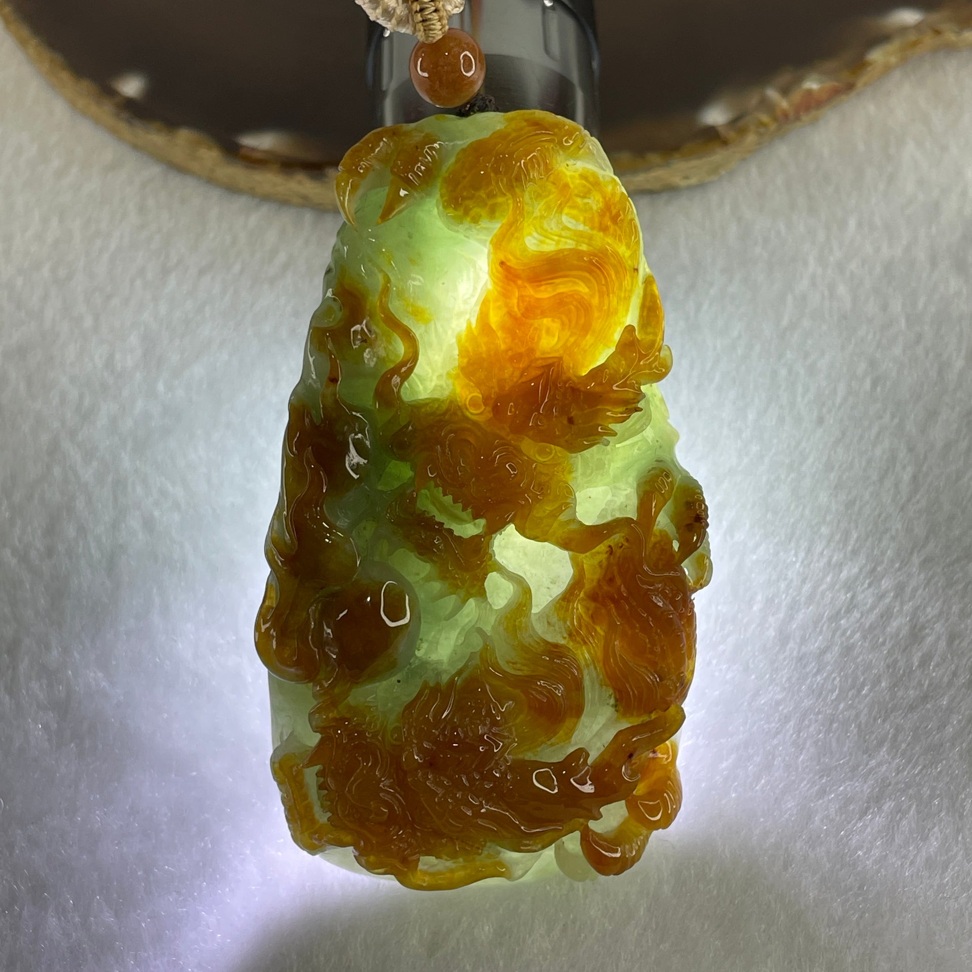 Grand Master Type A Green with Brownish Jadeite Dragon Double Side Pendant 125.78g 77.7 by 46.4 by 18.2mm - Huangs Jadeite and Jewelry Pte Ltd