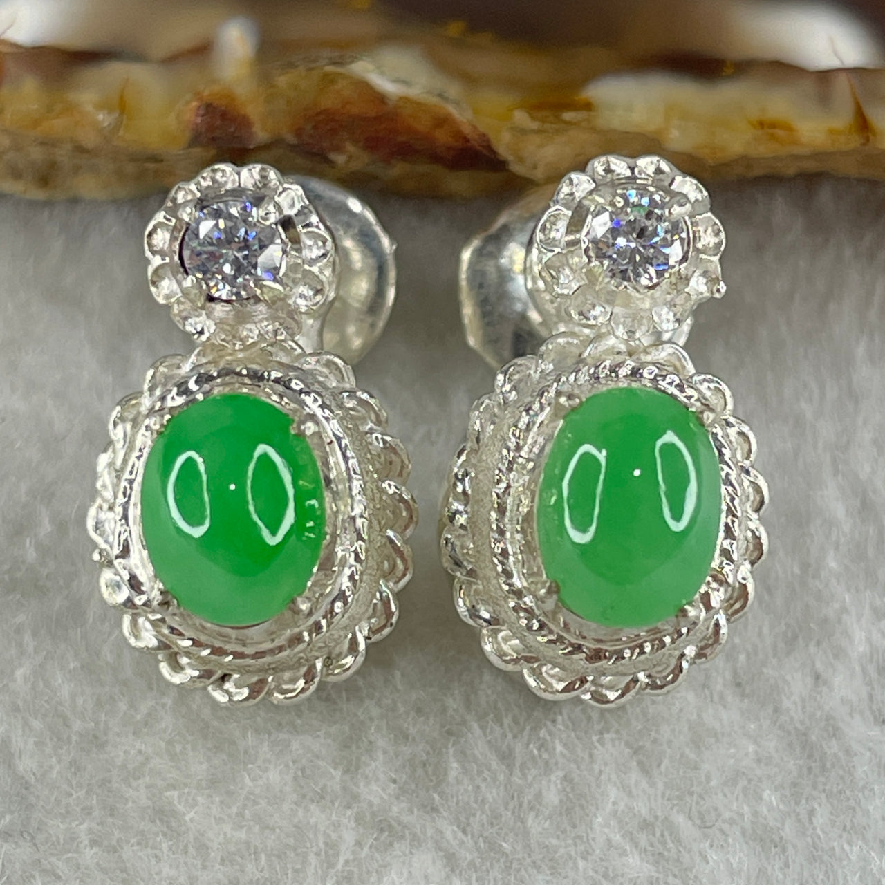 Type A Natural Apple Green Jadeite Cabochon 8.3 by 6.4 by 4.5m Stone for Setting 19.87g (On Silver Earrings Mold) - Huangs Jadeite and Jewelry Pte Ltd