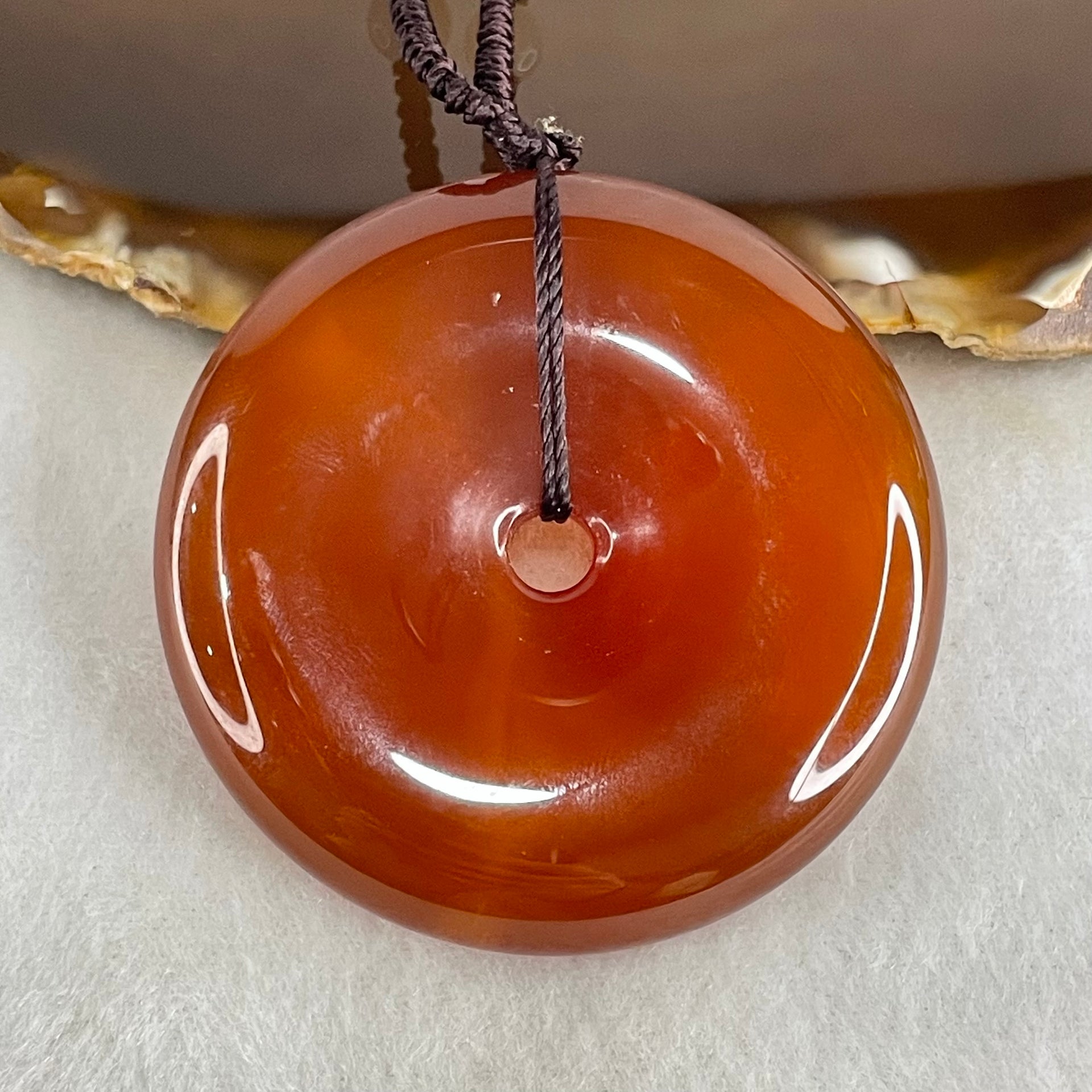 Natural Red Chalcedony Ping An Kou Donut 55.771g 52.6 by 11.2mm with White Crystal Beads Necklace 60cm - Huangs Jadeite and Jewelry Pte Ltd