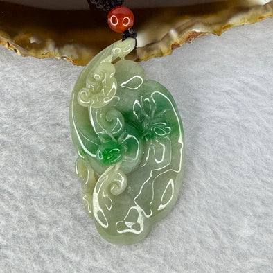 Type A Green Jadeite Ruyi with Lady Bugs Pendent 22.59g 50.0 by 25.9 by 14.0 mm - Huangs Jadeite and Jewelry Pte Ltd