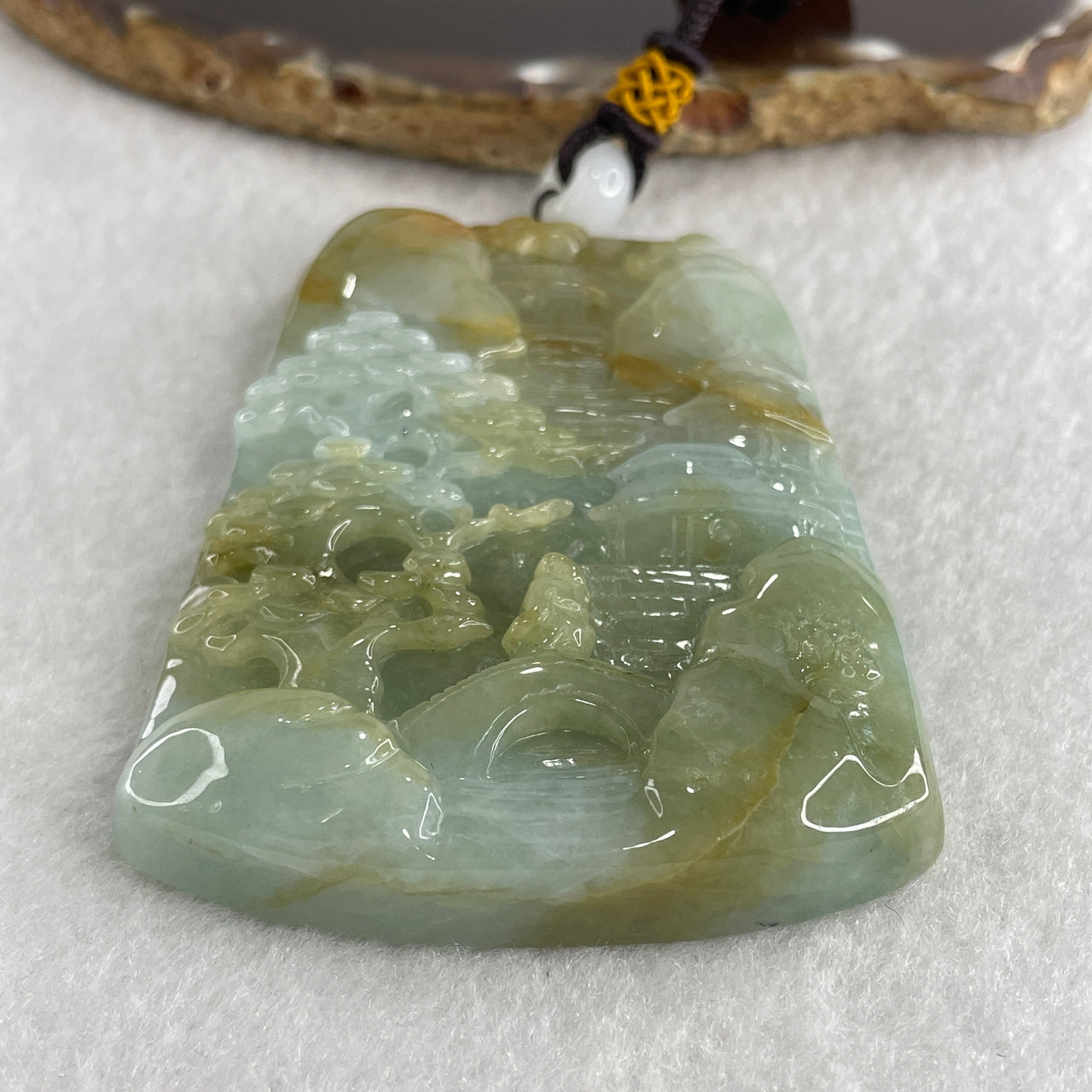 Natural Type A Sky Blue with Yellowish Green Jadeite Shan Shui with Gui Ren Benefactor Pendant 94.26g 75.5 by 55.5 by 10.5mm - Huangs Jadeite and Jewelry Pte Ltd