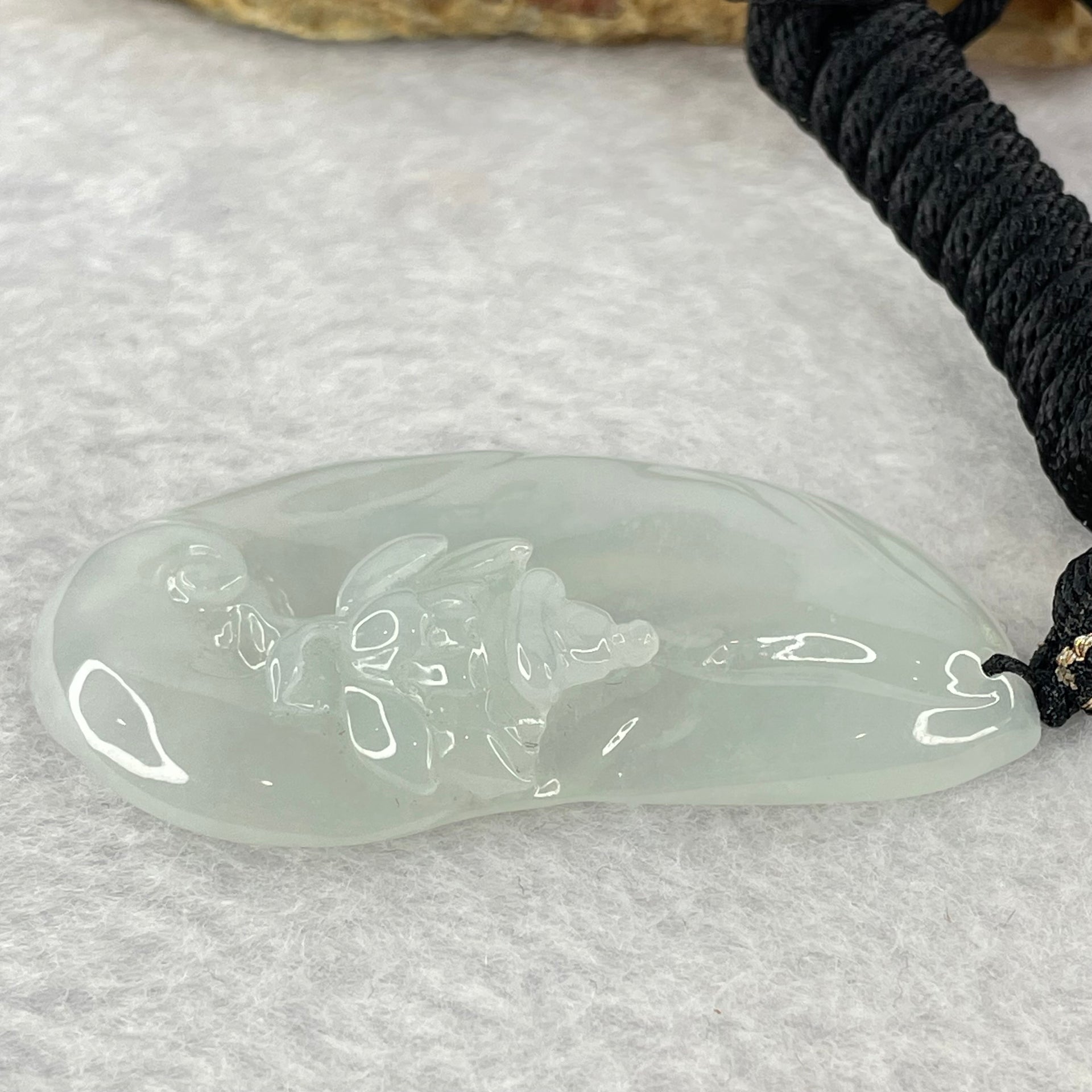 Type A Semi Icy Light Green Jadeite Benefactor on Lotus Flower Pendent 16.22g 52.1 by 26.5 by 7.9mm - Huangs Jadeite and Jewelry Pte Ltd