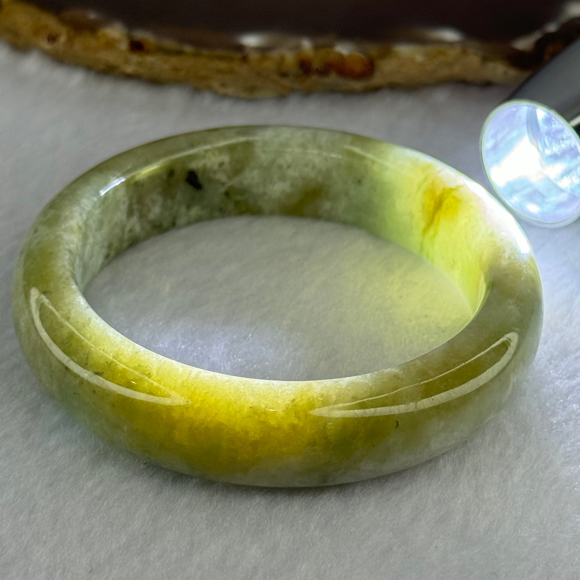 Type A Yellowish Green with Light Blueish Green Jadeite Bangle 67.97g Internal Diameter 54.1mm 14.3 by 9.0mm - Huangs Jadeite and Jewelry Pte Ltd