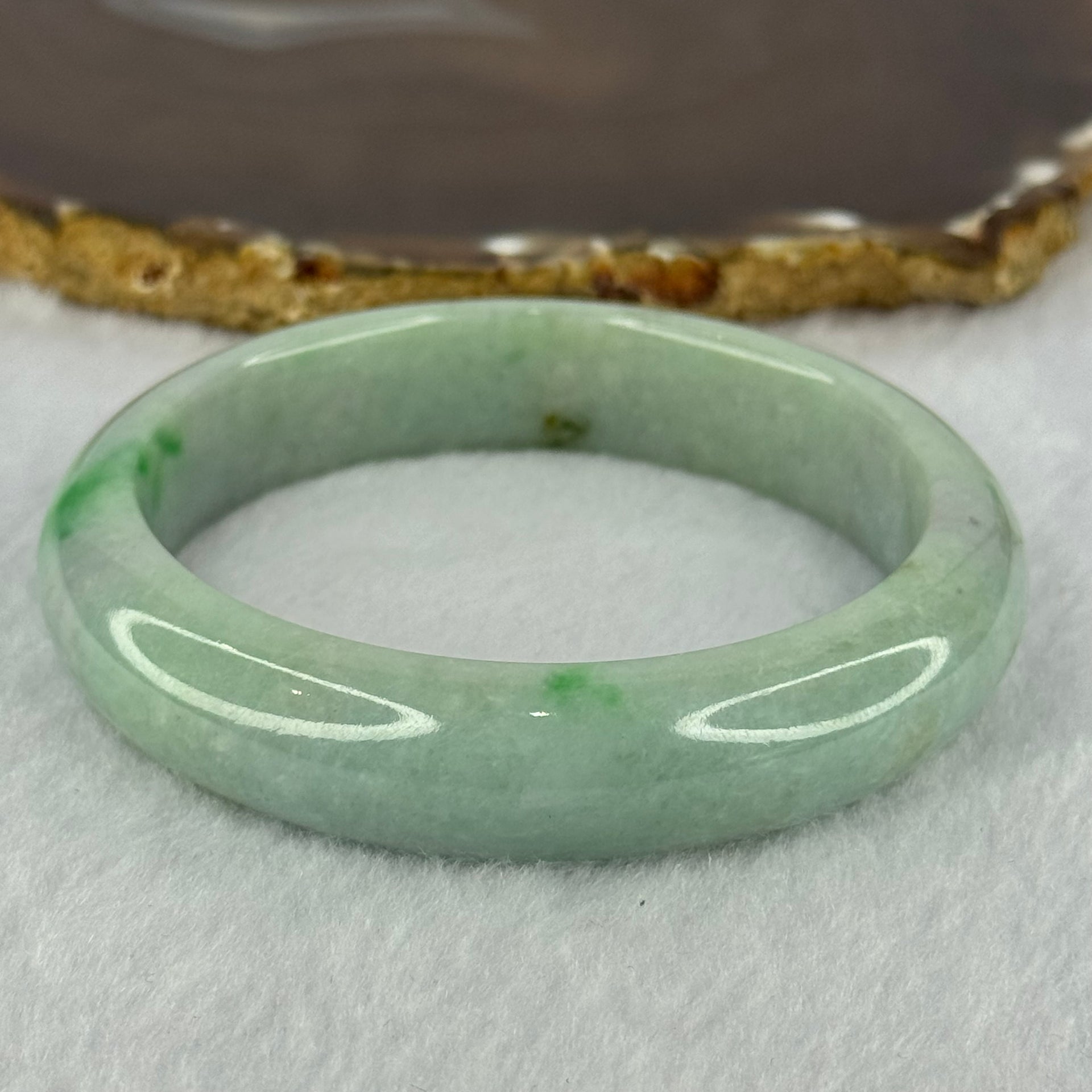 Type A Light Green with Bright Green Patches Jadeite Bangle 78.00g Internal Diameter 61.7mm 14.5 by 9.9mm (Very Slight External Rough) - Huangs Jadeite and Jewelry Pte Ltd