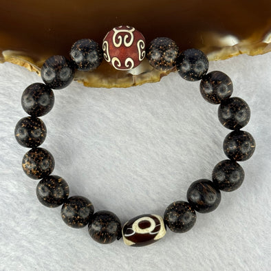 Natural Agarwood With 3 Eyes Dzi Bead Tian Zhu Beads Bracelet 天然沉香带三眼天珠手链 17.70g 16.5cm Dzi 14.4 by 10.1 and 14.0mm 1 Bead and 10.8mm 16 Beads - Huangs Jadeite and Jewelry Pte Ltd