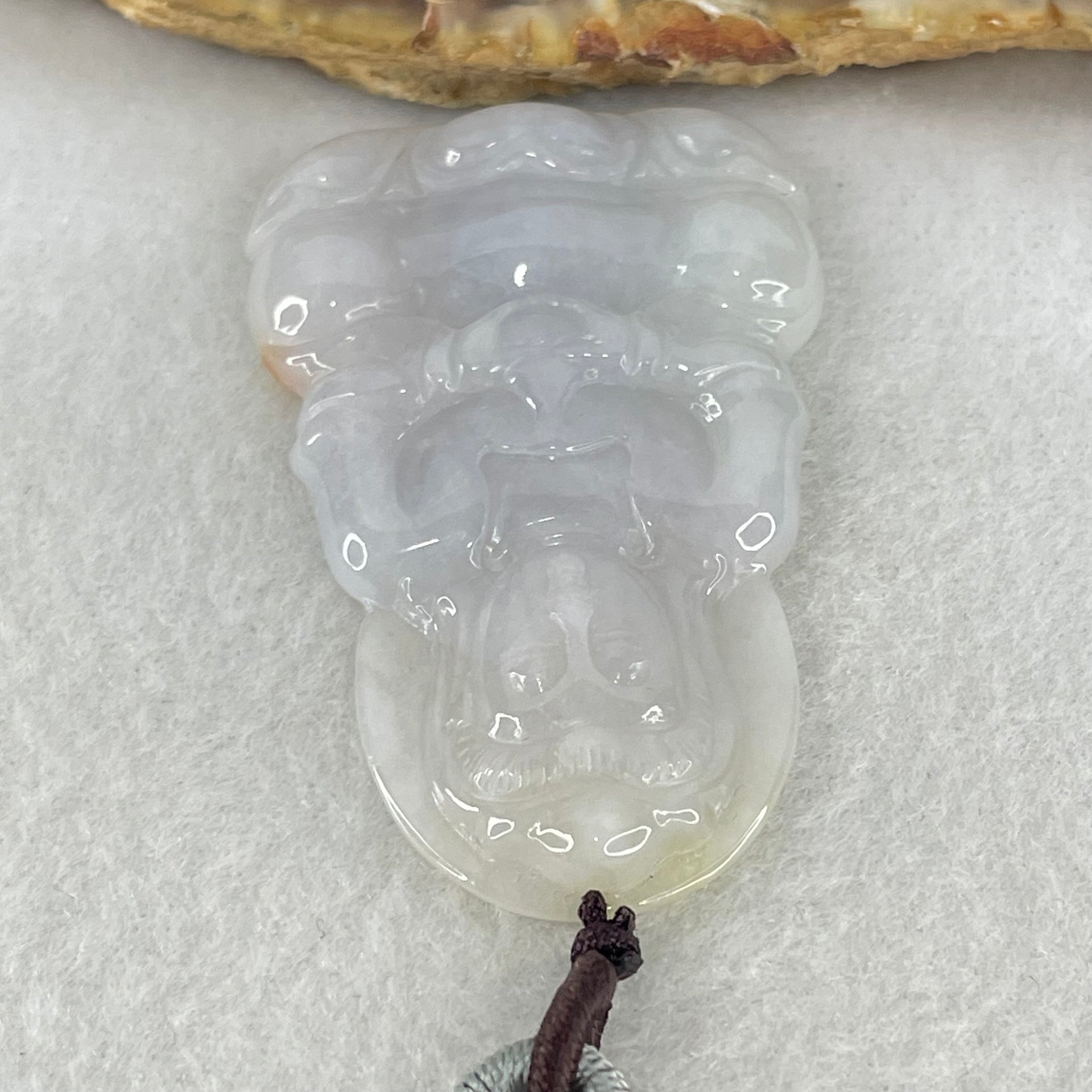 Type A Lavender Jadeite Guan Yin Pendant 16.26g 52.2 by 33.1 by 6.0mm - Huangs Jadeite and Jewelry Pte Ltd