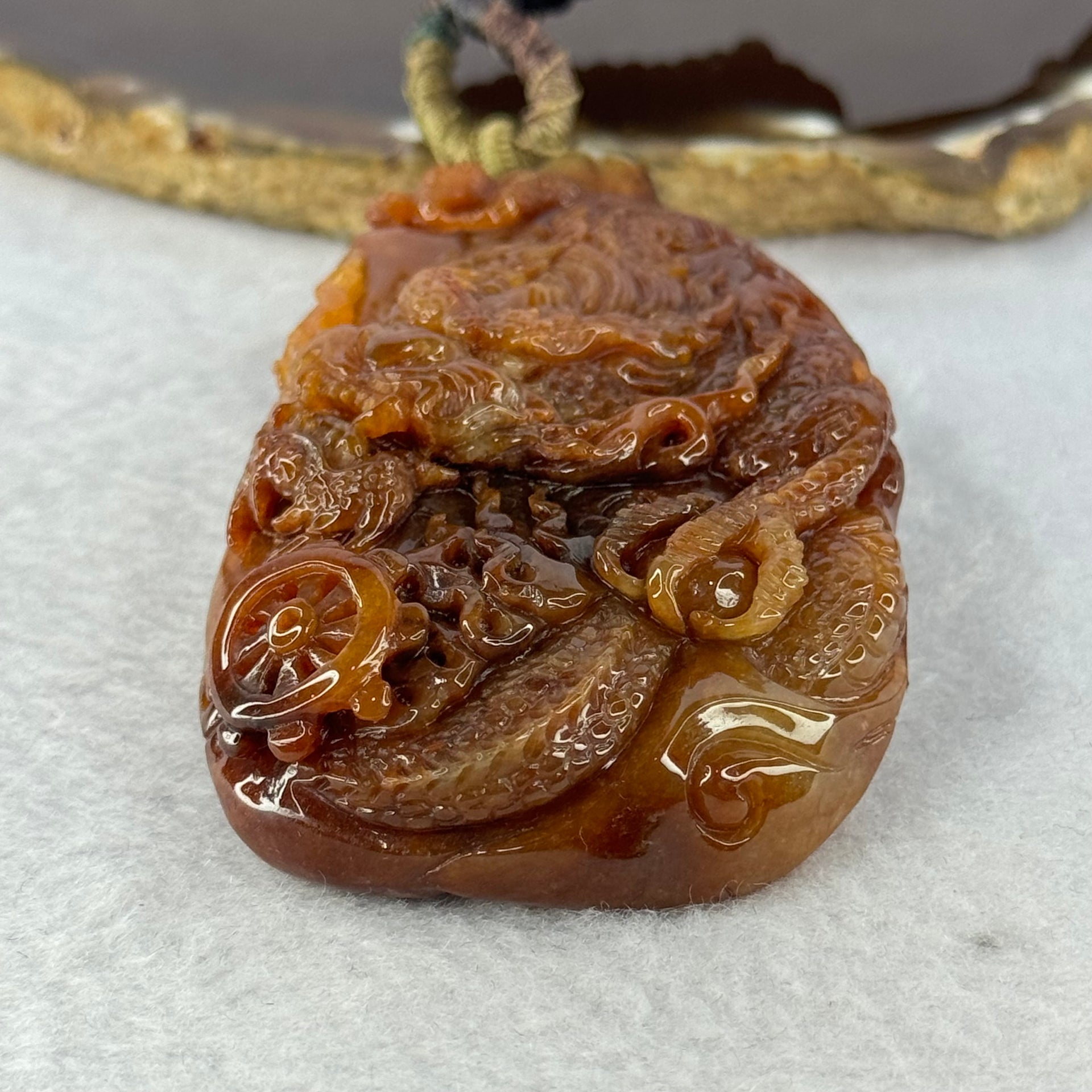 Grand Master Type A Red Jadeite Fire Dragon with Wheel 105.84g 81.5 by 47.0 by 17.5mm - Huangs Jadeite and Jewelry Pte Ltd