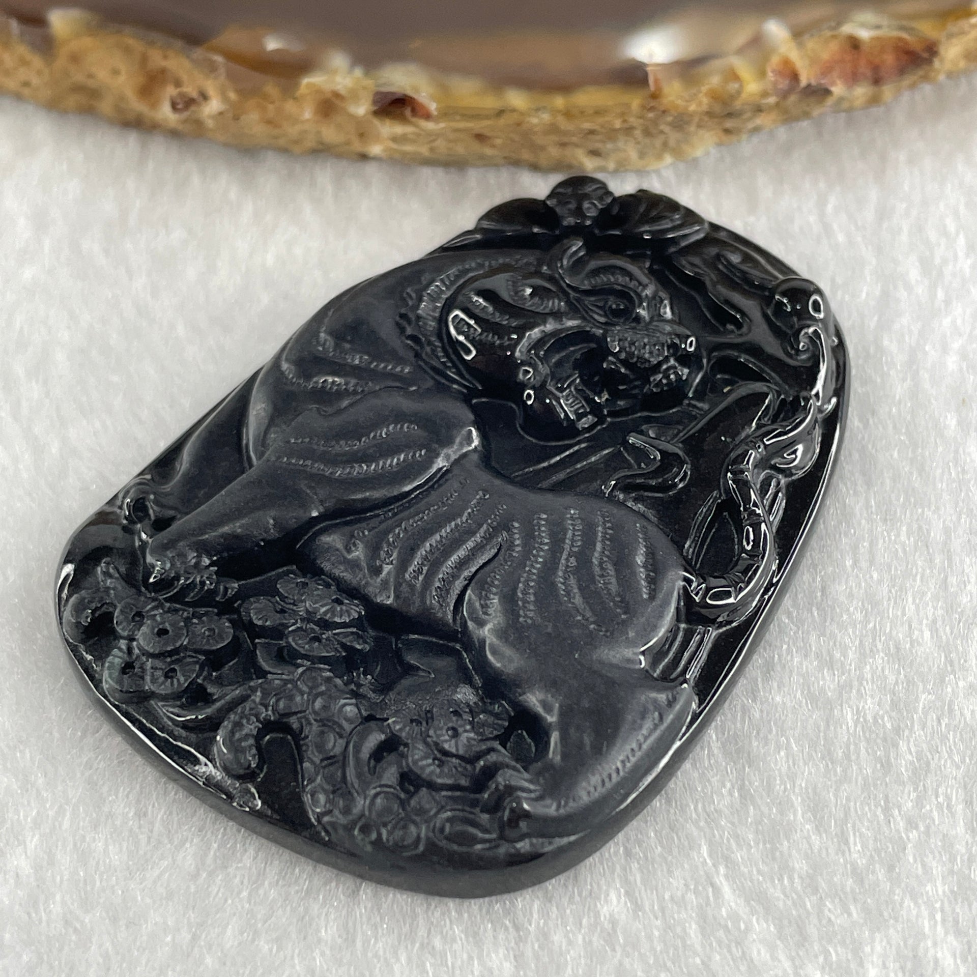 Type A Opaque to Partial Translucent Black Omphacite Jadeite Tiger Pendant 24.24g 56.8 by 40.5 by 7.5mm - Huangs Jadeite and Jewelry Pte Ltd