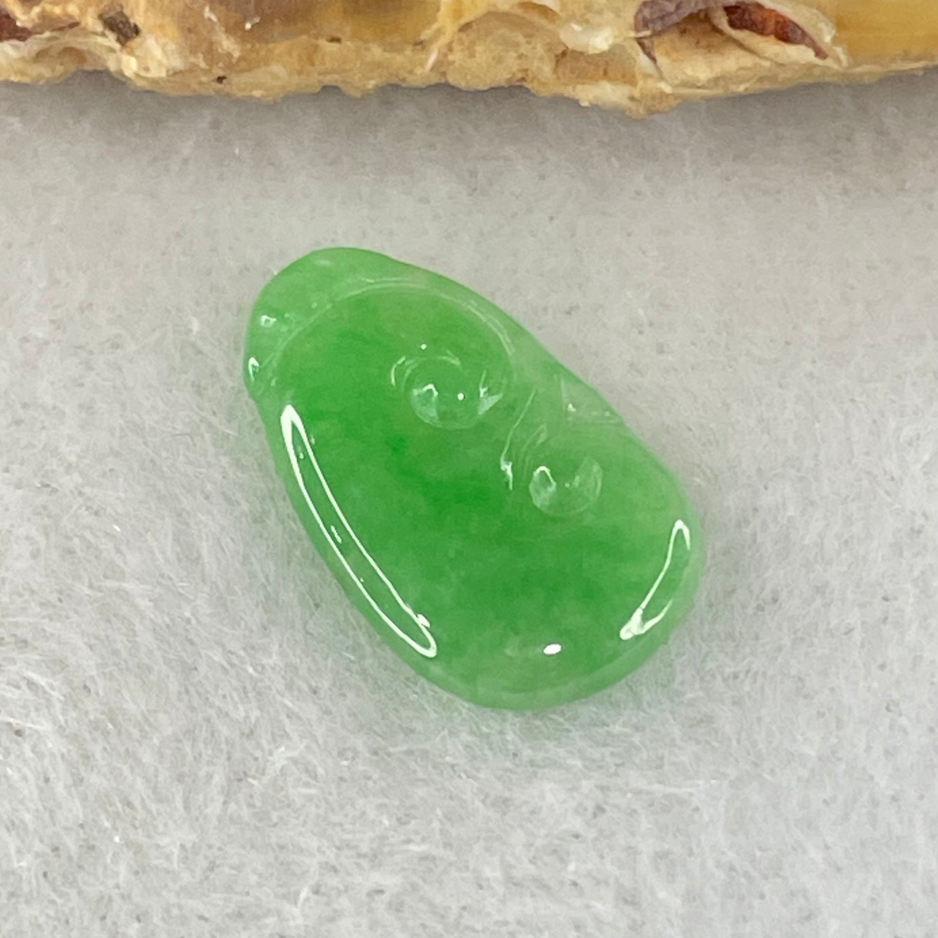 Type A Old Mine Spicy Green Jadeite Ruyi Charm Stone For Setting 0.36g 14.1 by 8.3mm by 1.4mm - Huangs Jadeite and Jewelry Pte Ltd