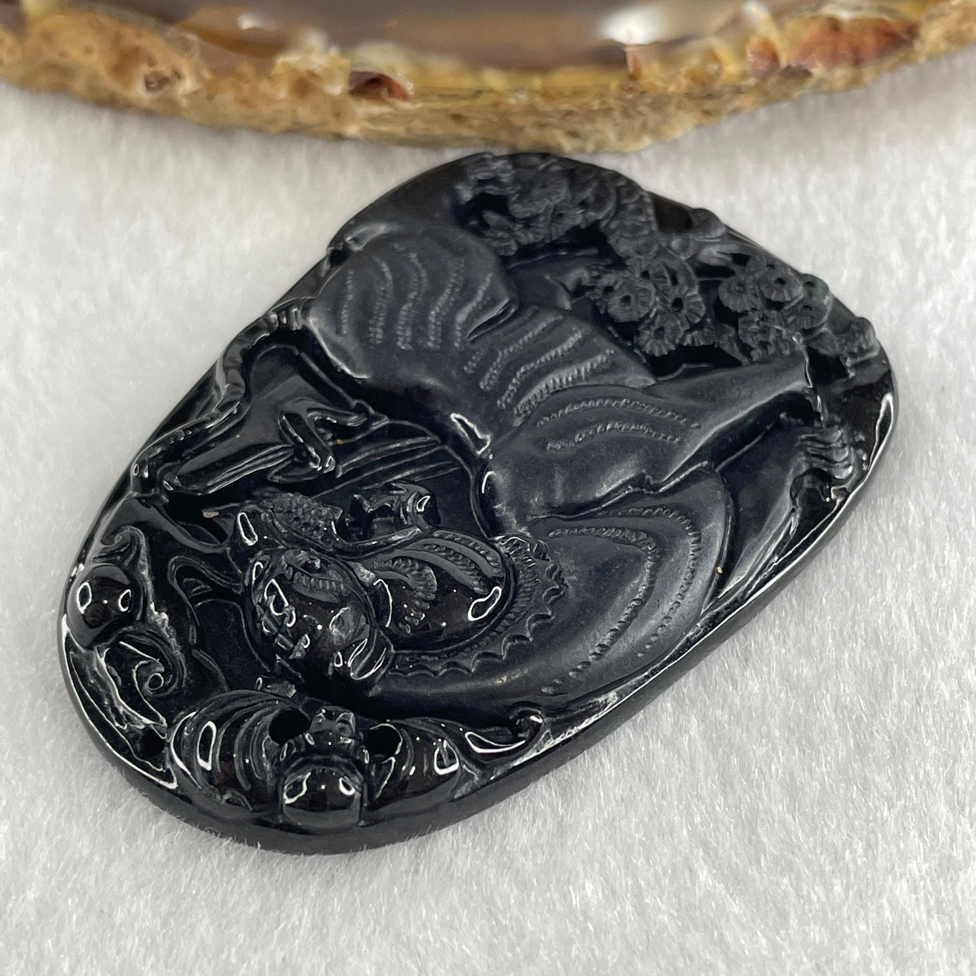 Type A Opaque to Partial Translucent Black Omphacite Jadeite Tiger Pendant 24.24g 56.8 by 40.5 by 7.5mm - Huangs Jadeite and Jewelry Pte Ltd