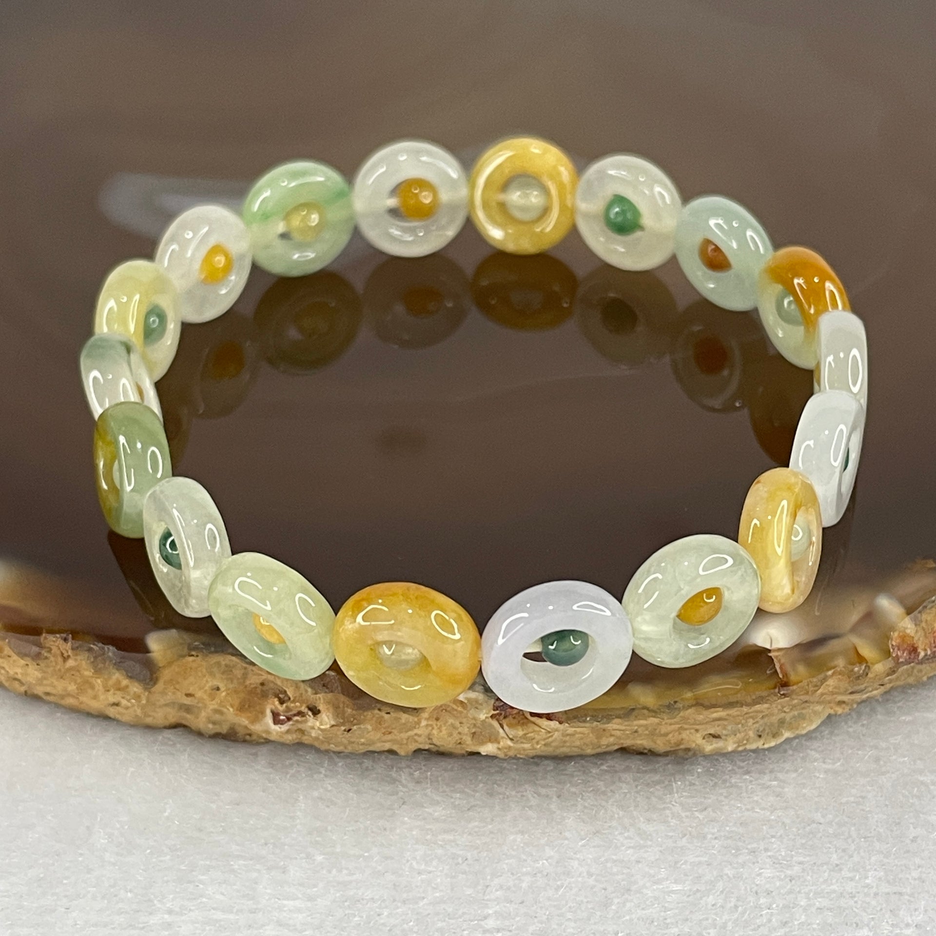 Natural Type A Muti Green with Lavender Yellowish Jadeite Donut Bracelet 12.17g 15.5cm 9.9 by 3.2mm 18 Ping An Kow - Huangs Jadeite and Jewelry Pte Ltd