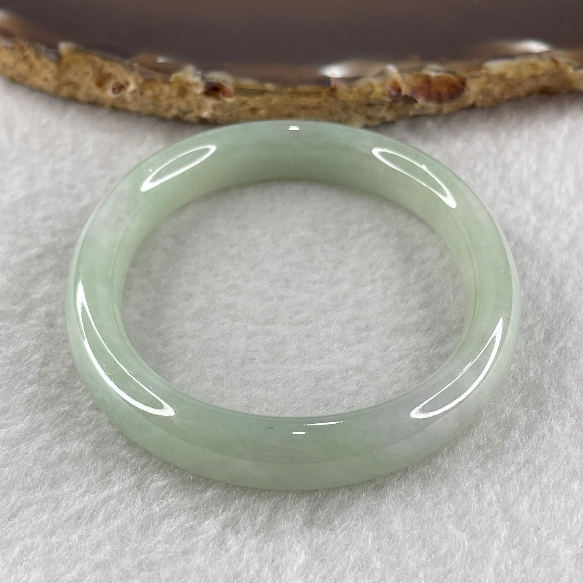 Type A Jelly Full Light Green Jadeite Oval Bangle Internal Diameter 53.7mm 31.30g 9.7 by 7.0mm (Very Very Slight Internal Lines) - Huangs Jadeite and Jewelry Pte Ltd
