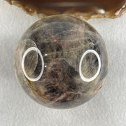 Natural Black Moonstone Ball with Clear Acrylic Display 443.95g 69.0 by 90.0mm - Huangs Jadeite and Jewelry Pte Ltd