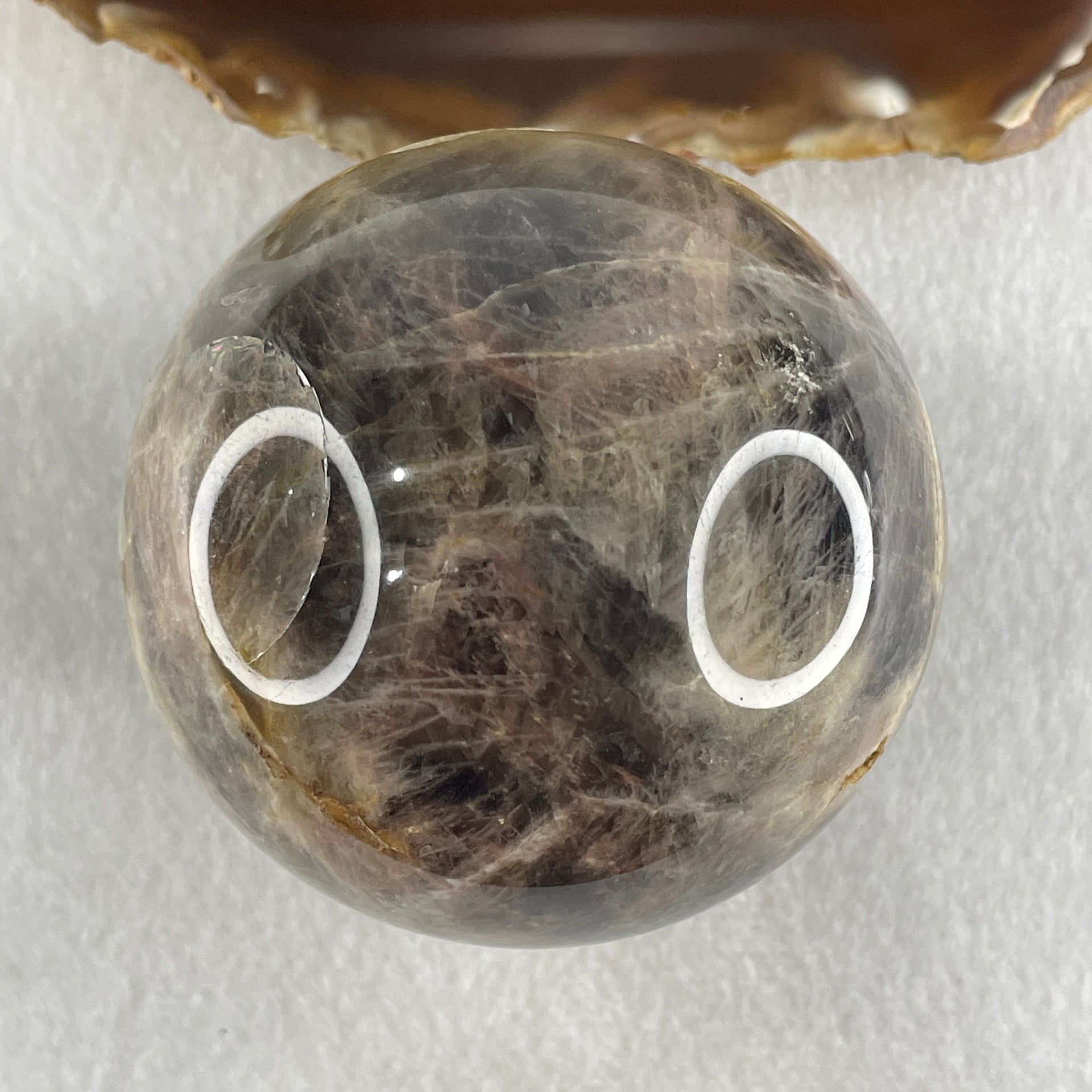 Natural Black Moonstone Ball with Clear Acrylic Display 443.95g 69.0 by 90.0mm - Huangs Jadeite and Jewelry Pte Ltd