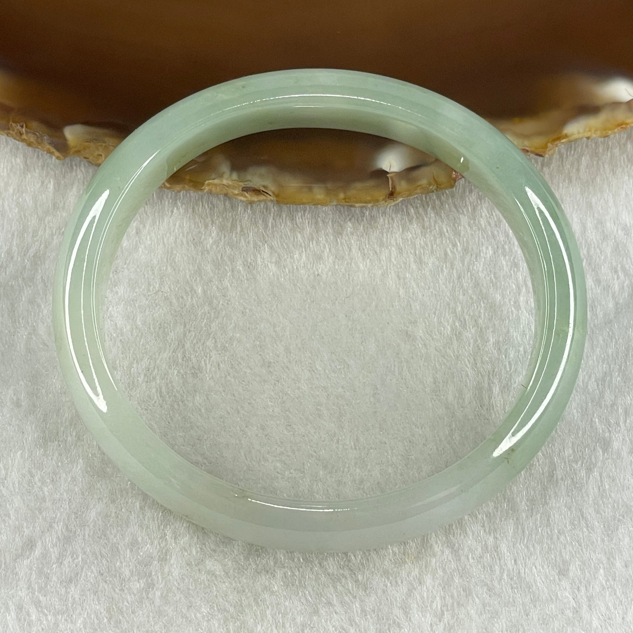 Natural Type A Jelly Light to Faint Green Jadeite Oval Bangle 36.74g Inner Diameter 55.0mm 12.0 by 6.5mm (Close to Perfect) - Huangs Jadeite and Jewelry Pte Ltd