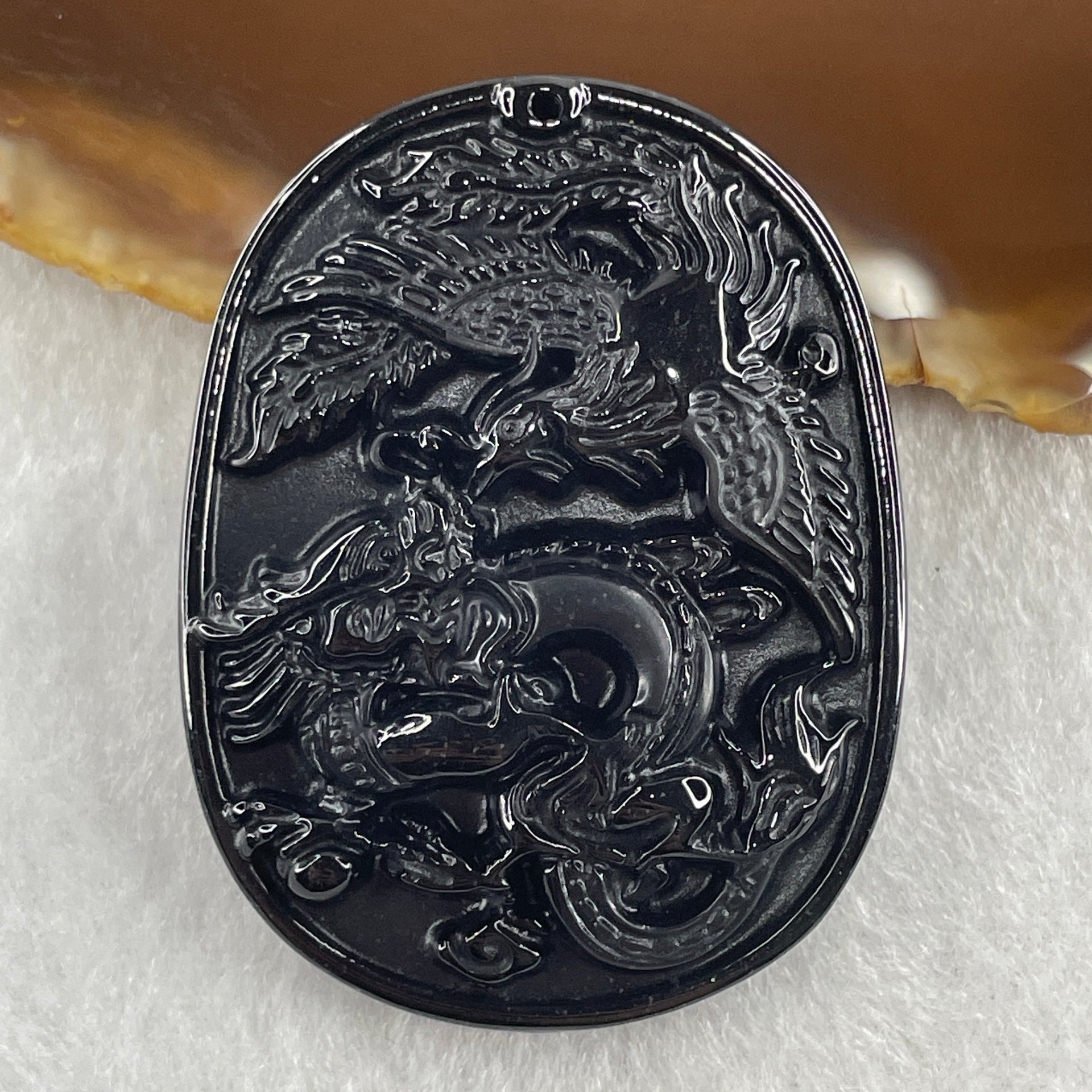 Type A Opaque to Partial Translucent Black Omphacite Jadeite Dragon and Phoenix Pendant 20.96g 50.2 by 38.3 by 8.4mm - Huangs Jadeite and Jewelry Pte Ltd