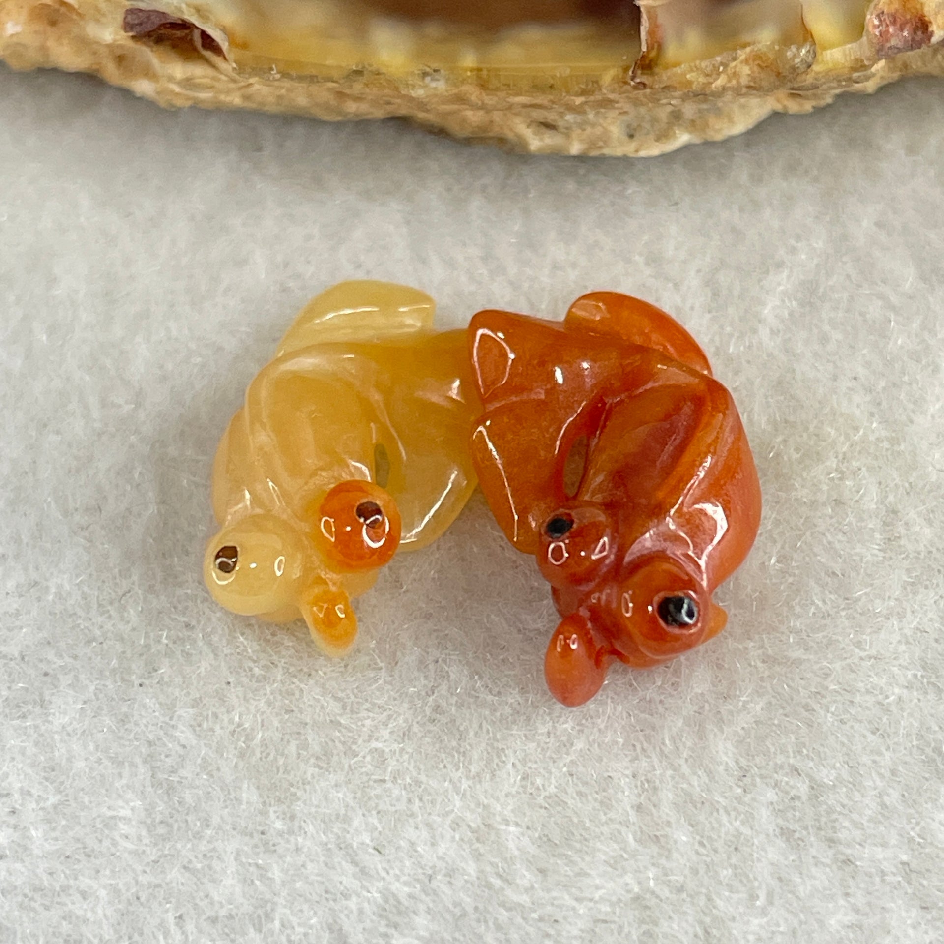 Natural Type A Yellow and Red Jadeite Pair Gold Fish Charm each 0.97g 16.9 by 9.4 by 5.5mm and 1.21g 17.0 by 9.8 by 5.7mm - Huangs Jadeite and Jewelry Pte Ltd