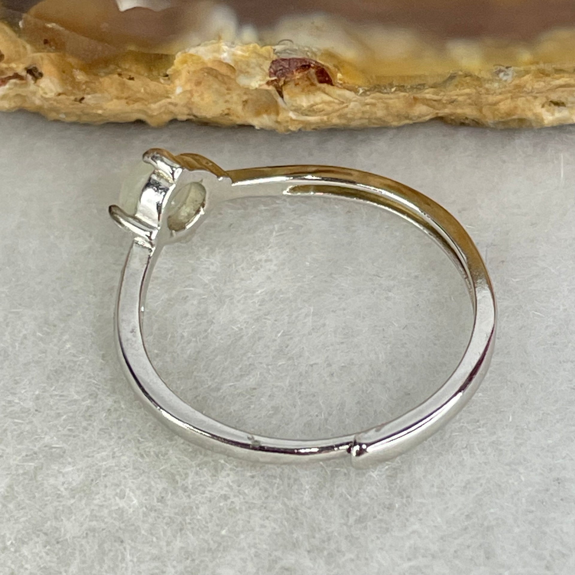Type A Icy Faint Green Cabochon Jadeite in S925 Sliver Ring (Adjustable Size) 1.05g 4.5 by 3.0mm - Huangs Jadeite and Jewelry Pte Ltd