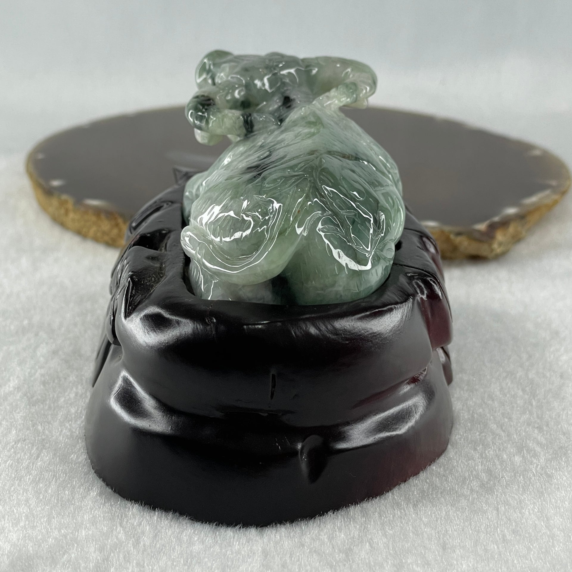 Natural Type A Light Green Light Lavender with Dark Green Patches Jadeite Ox with Wooden Stand Display 341.7g 116.5 by 73.9 by 66.0mm - Huangs Jadeite and Jewelry Pte Ltd