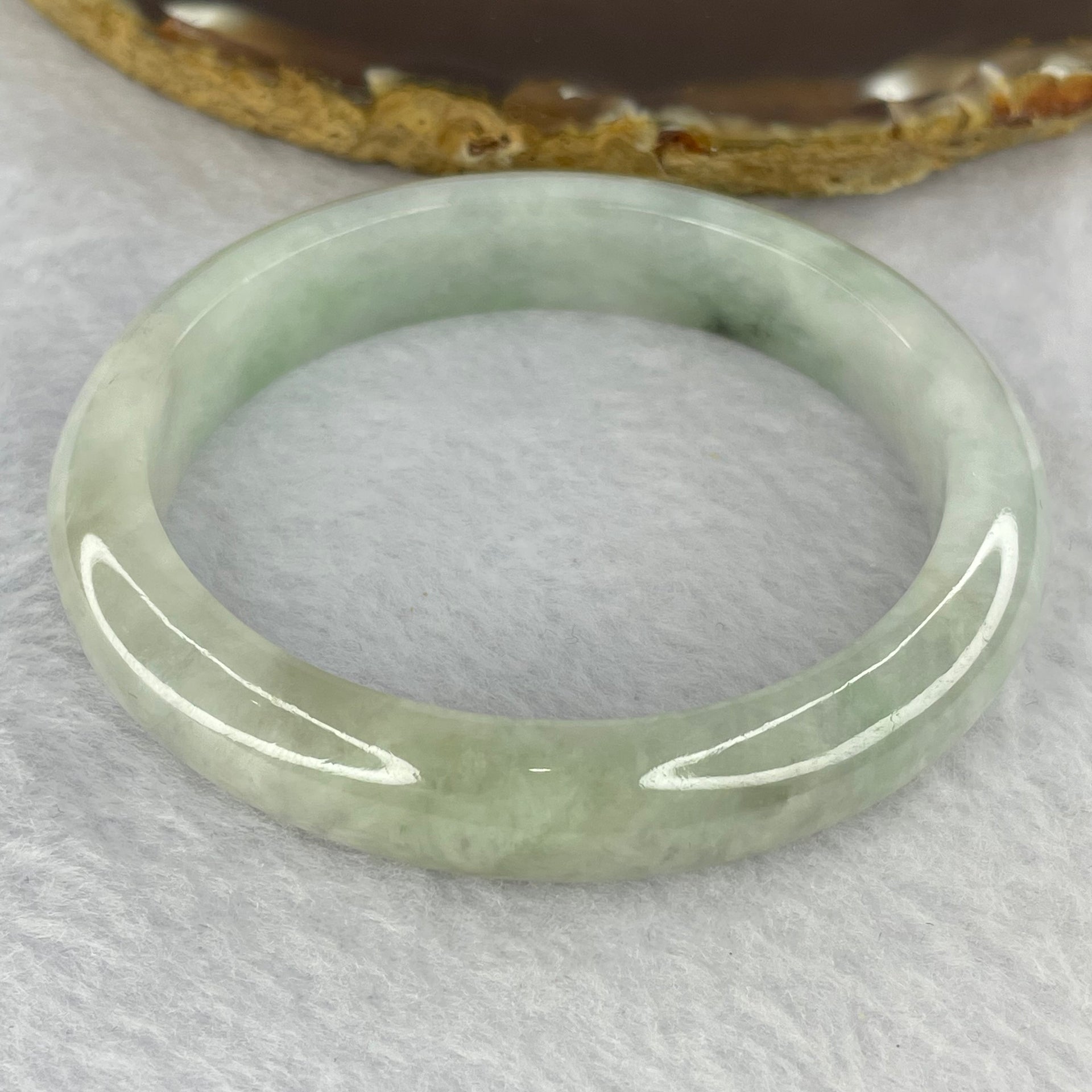 Type Seni Icy Light Sky Blue With Blueish Green Piao Hua 47.68g 12.0 by 8.1 mm Internal Diameter 56.8 mm (Slight External Lines) - Huangs Jadeite and Jewelry Pte Ltd