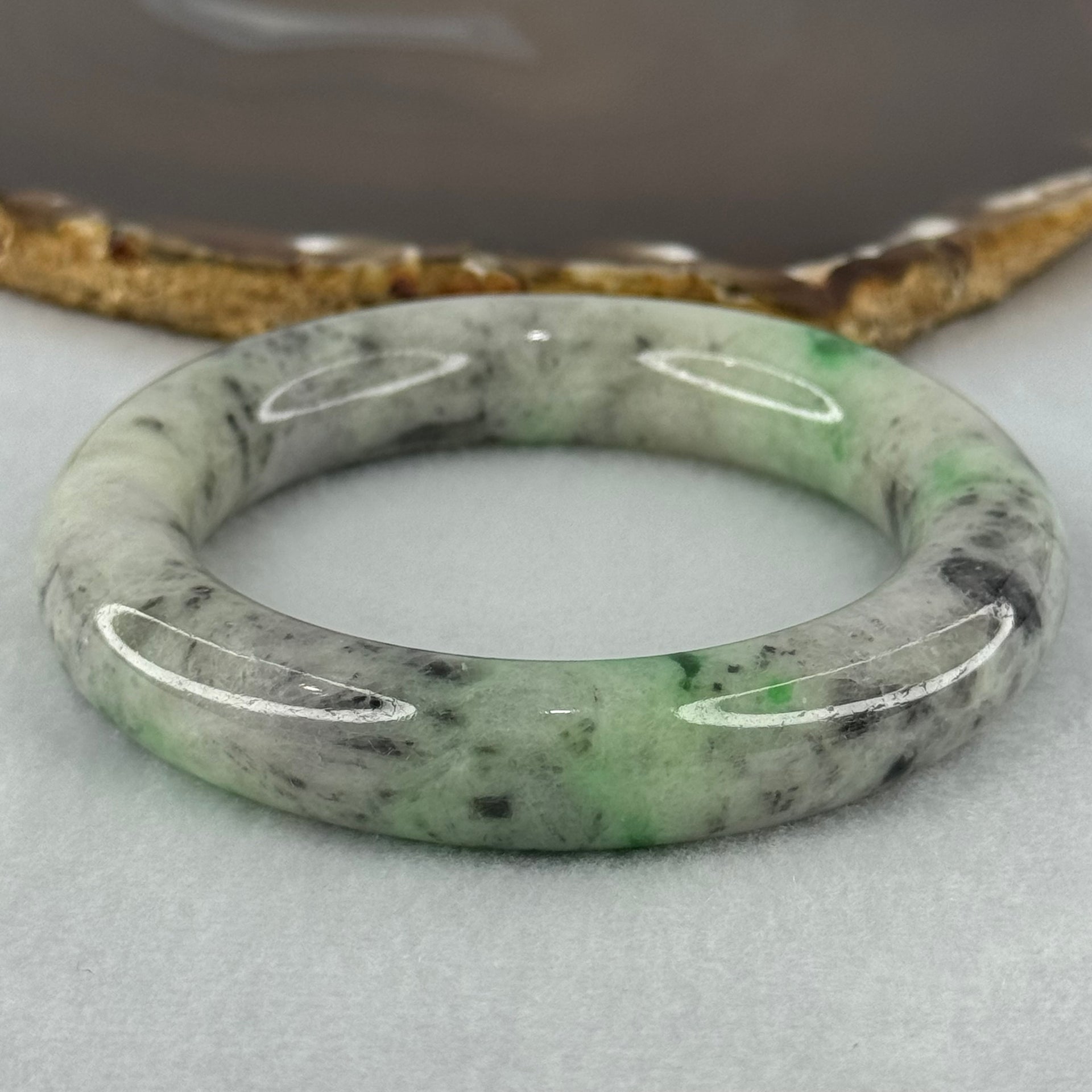 Type A Light Green with Emerald Green and Grey Patches Jadeite Bangle Internal Diameter 55.8mm 93.21g 13.4 by 13.1mm (Very Slight External Rough with Slight Internal Lines) - Huangs Jadeite and Jewelry Pte Ltd