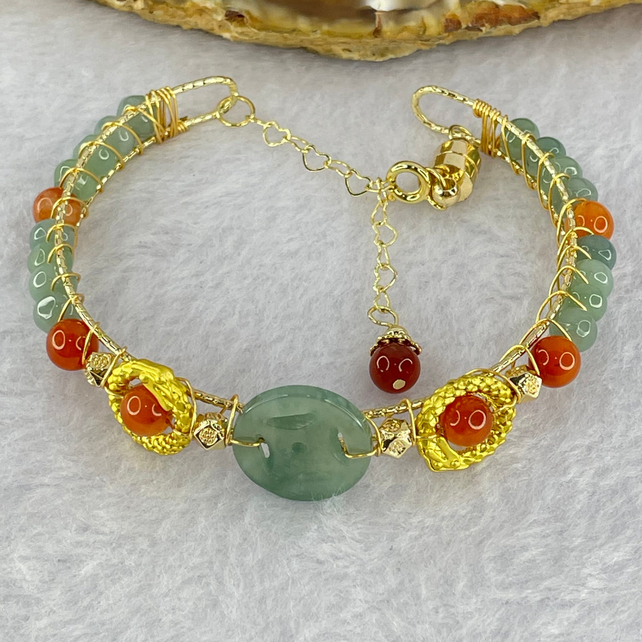 Type A Icy Blueish Green Jadeite Coin 15.6 by 2.5mm and Jadeite Beads in Gold Color Bracelet 14.08g 16cm 5.5 by 4.0mm 16 Beads - Huangs Jadeite and Jewelry Pte Ltd