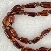 Natural Tea Color Blood Amber Irregular Beads Necklace 天然茶色血珀项链 14.99g 10.3 by 6.5 by 5.2mm 37pcs - Huangs Jadeite and Jewelry Pte Ltd